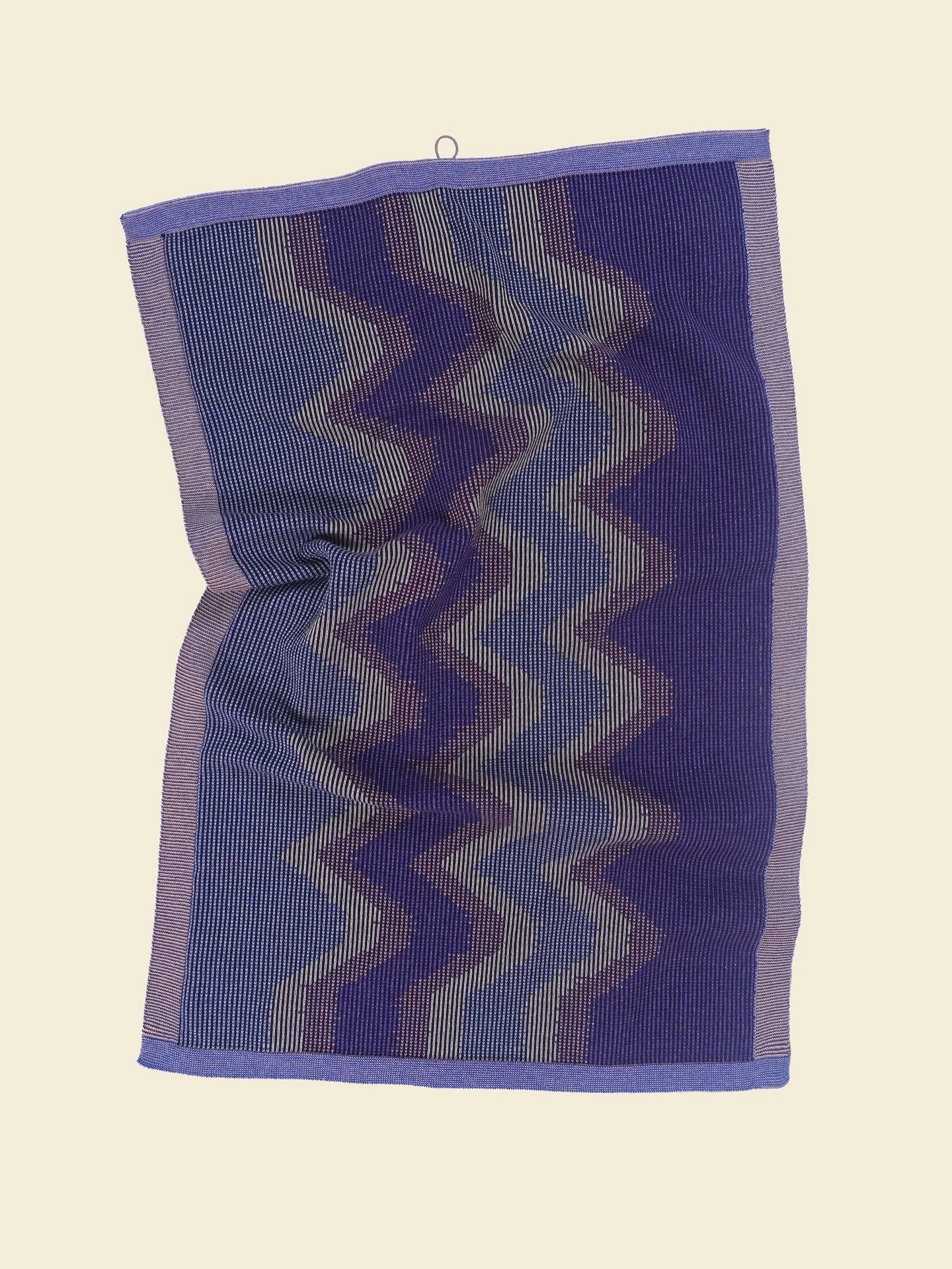 A set of 2 organic cotton kitchen towels. Shop at www.boi-knit.com

A sustainable knitted kitchen towel made from organic cotton. Inspired by woven ikat textiles, it embraces imprecise graphics for a unique, artistic look. The special weave-in techni