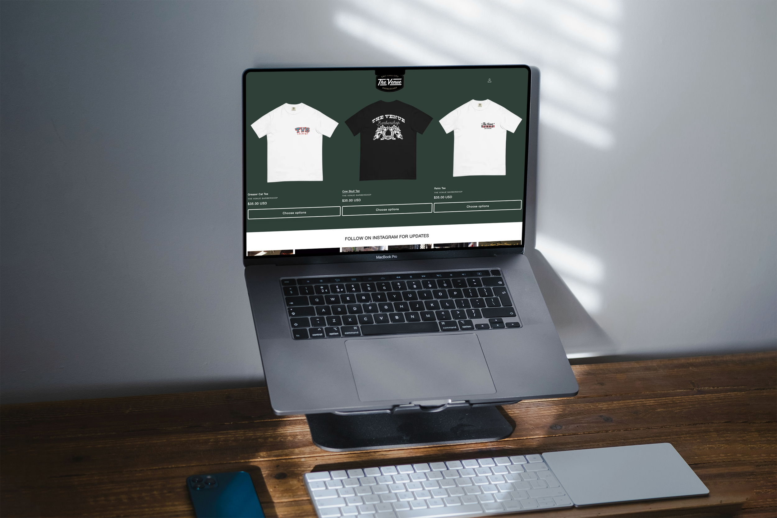 Free MacBook Pro on Stand Mockup.png