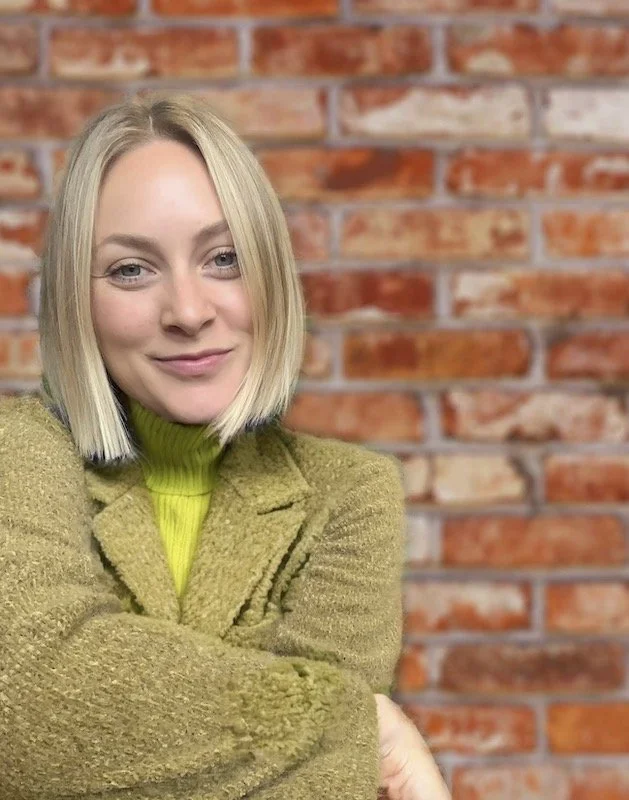 Snow-capped Colorado mountain with evergreen forest beneath cloudy sky – nature imagery reflecting mindfulness, somatic therapy, and holistic counseling in Lafayette and Boulder, CO.