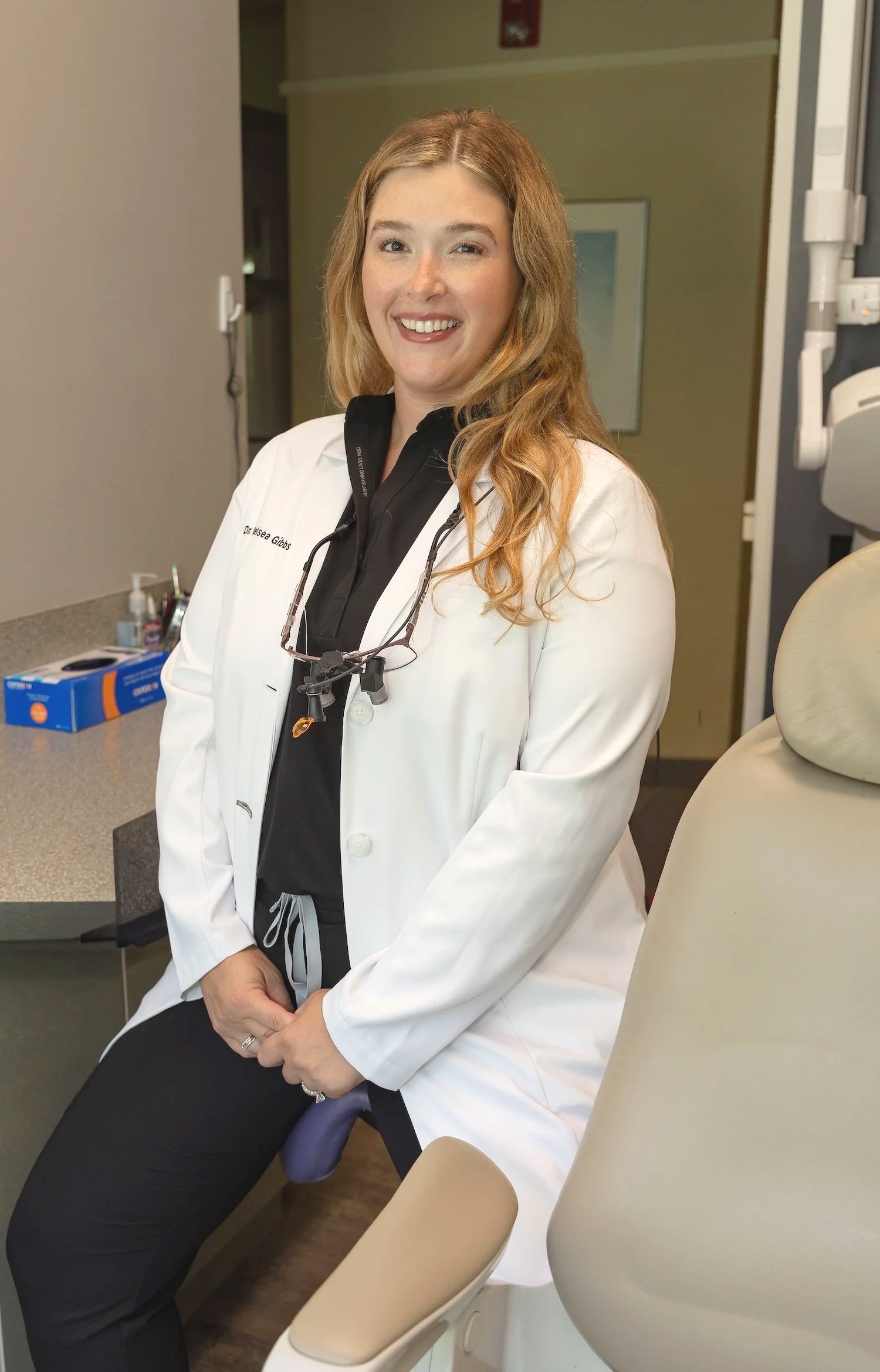 dentistsittingbyexamchair