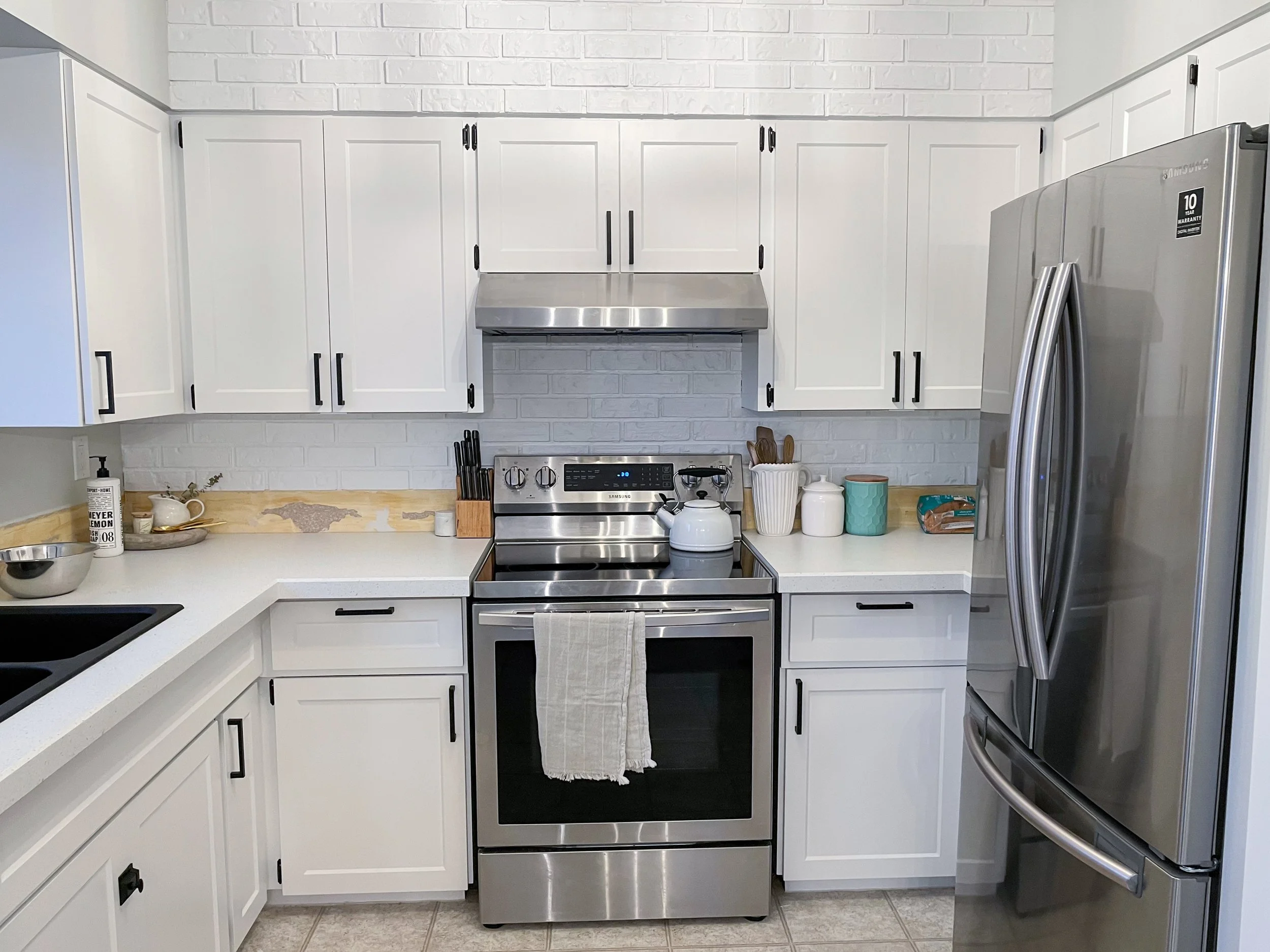 Sev install the counter top sink new cabinet doors and handles