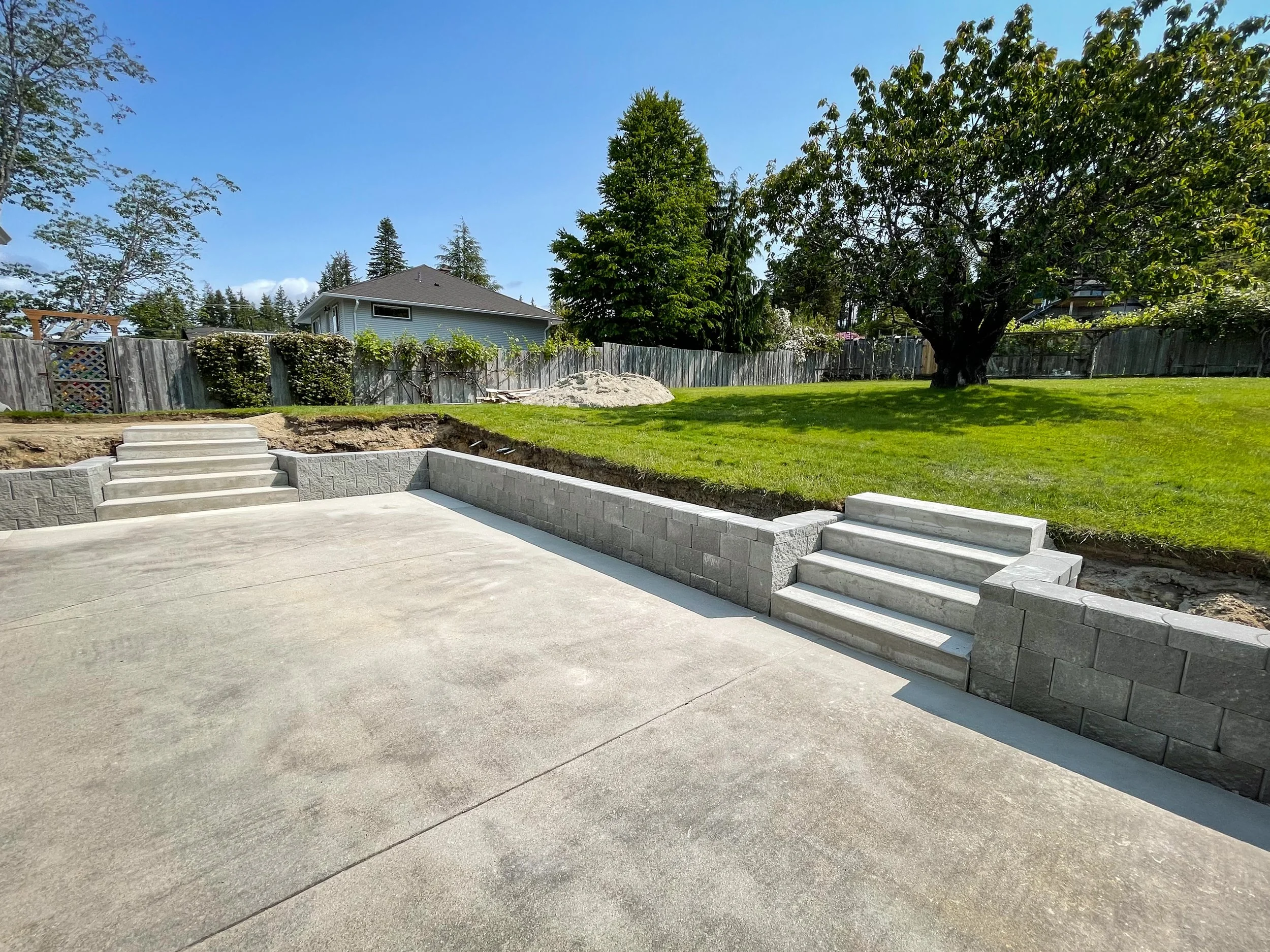 Powell River B.C. Terra Force blocks L17 retaining wall. Stacked construction supplied block and installed