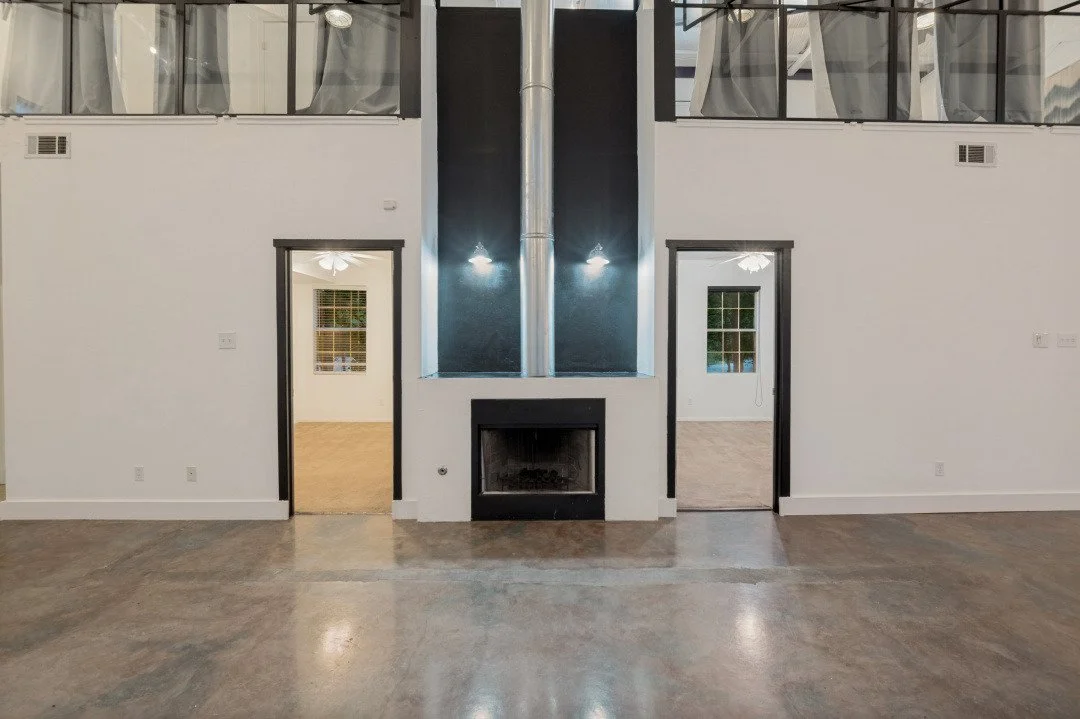 1233 Lady Lane Living Room Fireplace and Bedroom Entrances.jpg