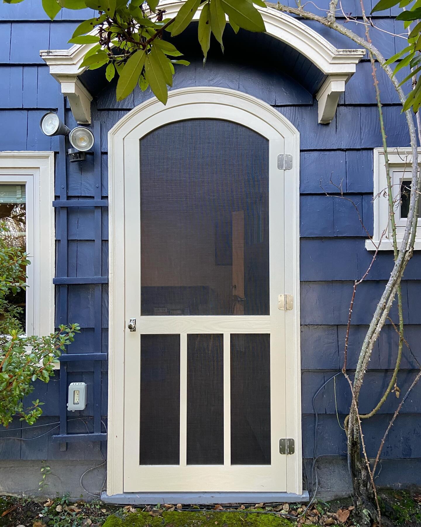 Crafted vintage charm for the basement door of this 1925 Andrew Loveless house in Leschi. 🏡 Embracing the era with a custom-built screen door &ndash; a blend of nostalgia and craftsmanship. Now, workouts in the basement come with cool, fresh air and