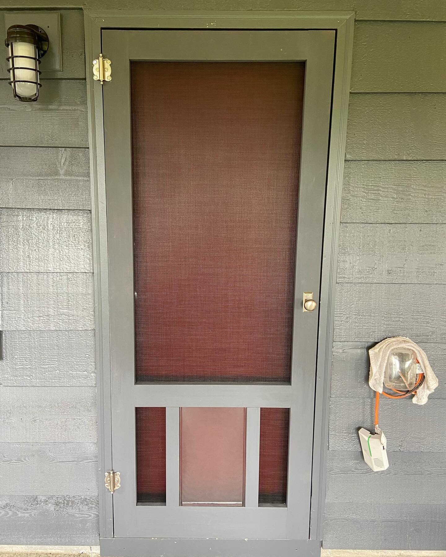This home in Seward Park has an incredible backyard for their two Corgi pups (and their furry friends) to run around in. Naturally, they needed a doggie door in their screen door so those energetic pups could run and play free without having to const