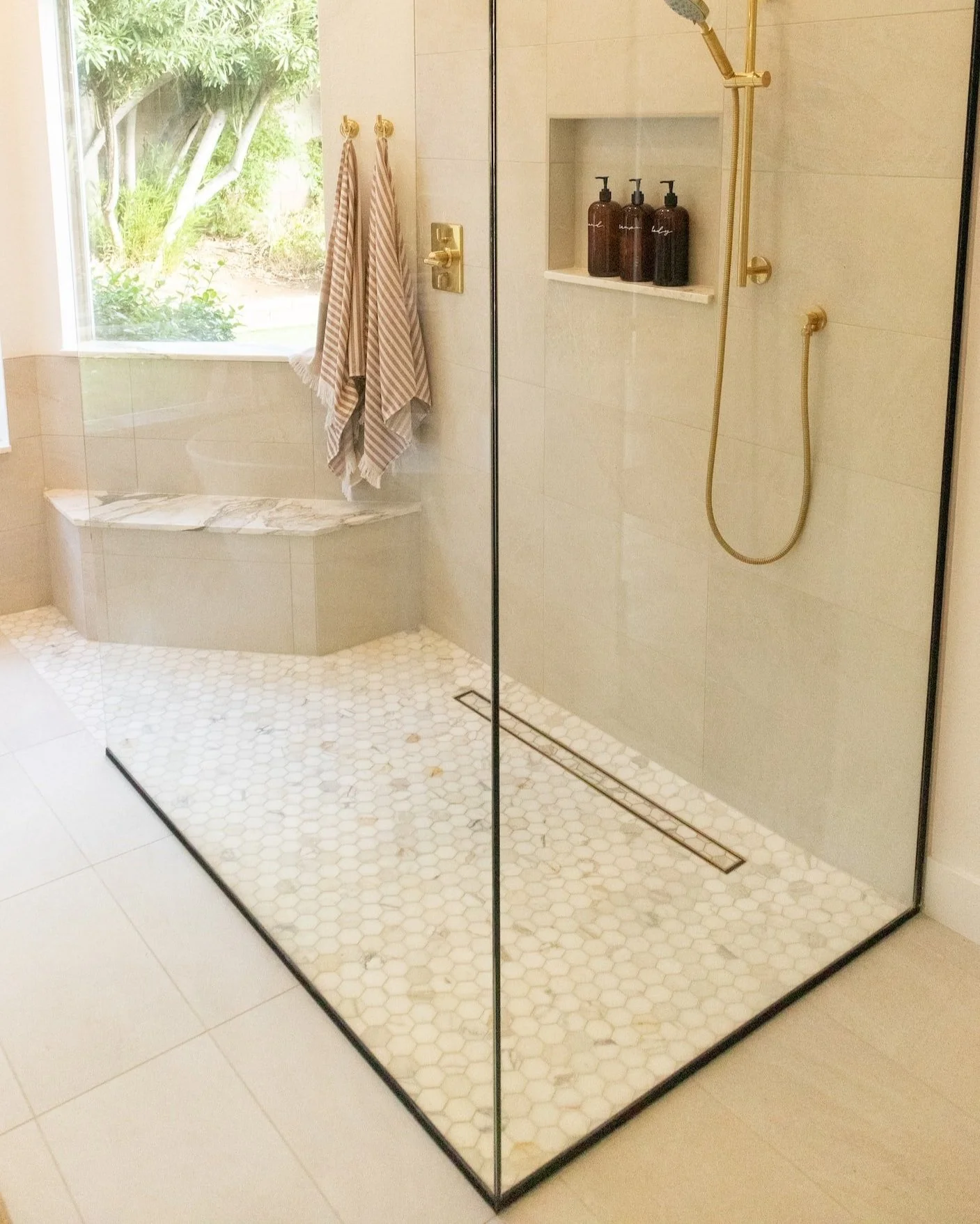 Our Favorite Shower Floor Tile Trends — The Space: Let's Talk Interior ...