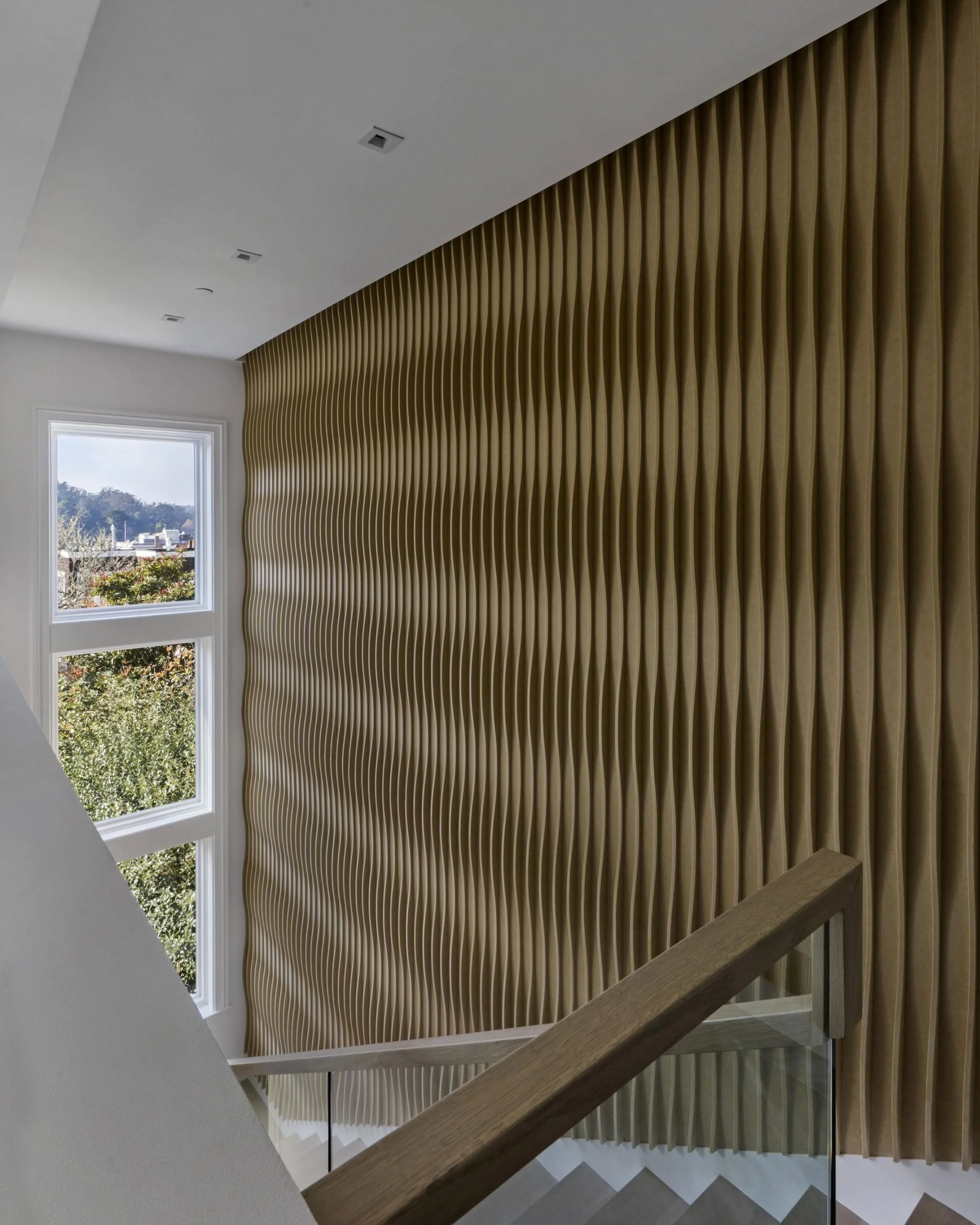 3D sculpted acoustical wall panel with Golden Gate bridge view from a Pacific Heights post war remodel, modern interiors. 
