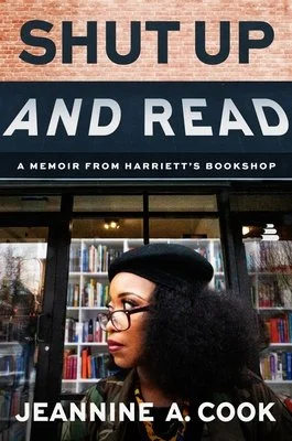 Book cover titled "Shut Up and Read" by Jeannine A. Cook, featuring a woman with glasses and curly hair in front of a bookshelf.