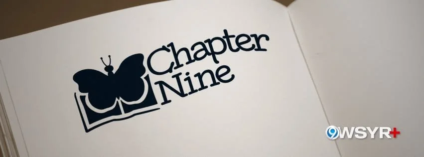 Open book displaying 'Chapter Nine' with a black butterfly illustration on the page.