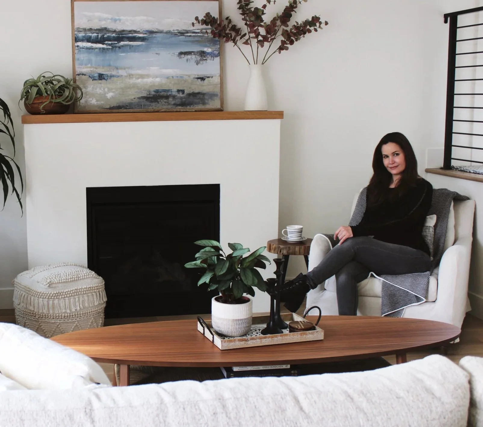 Our owner and lead designer, Tania Perez, relaxing at one of our full interior design projects.