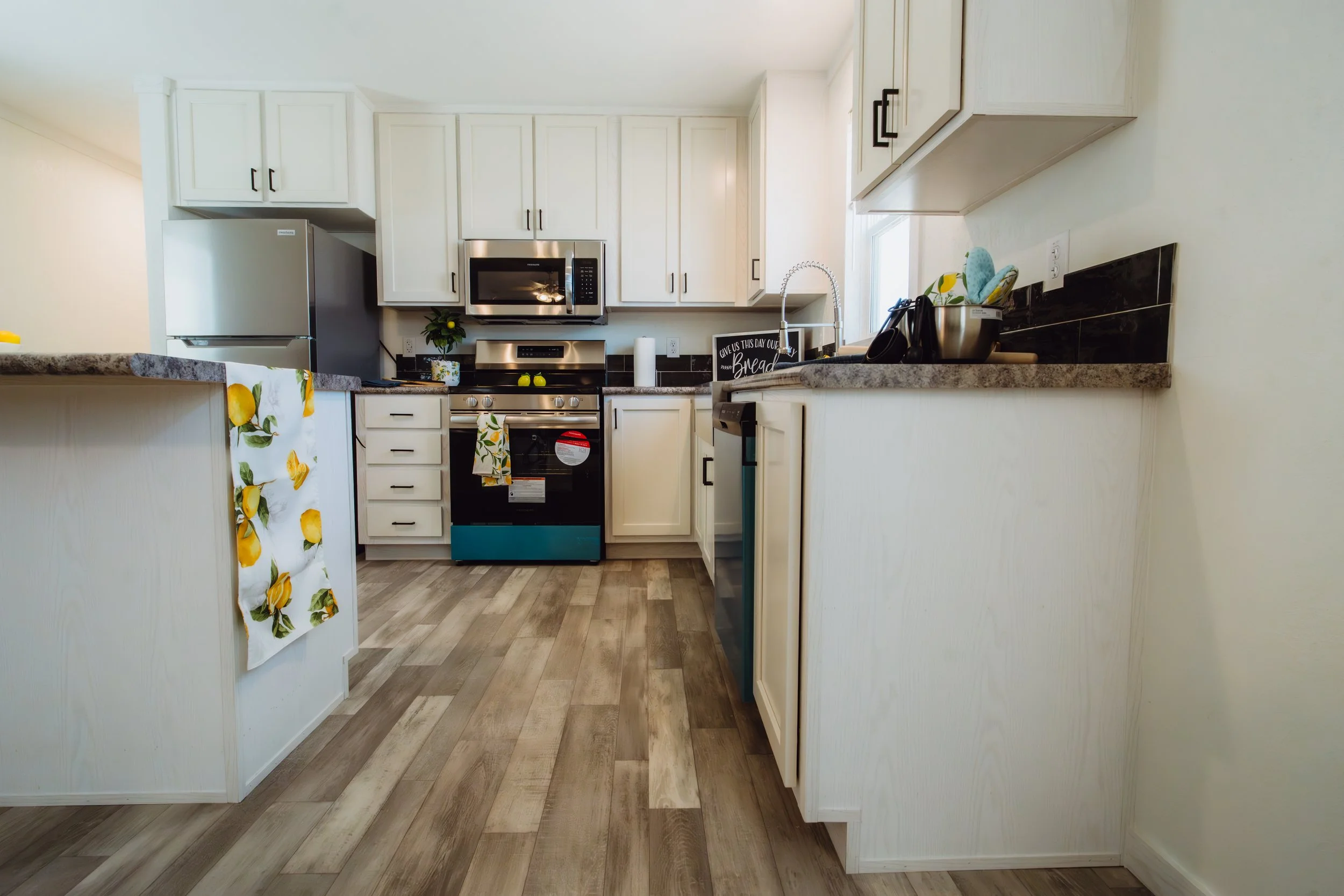 Modern kitchen interior inside a manufactured home at Homestead Corpus Christi