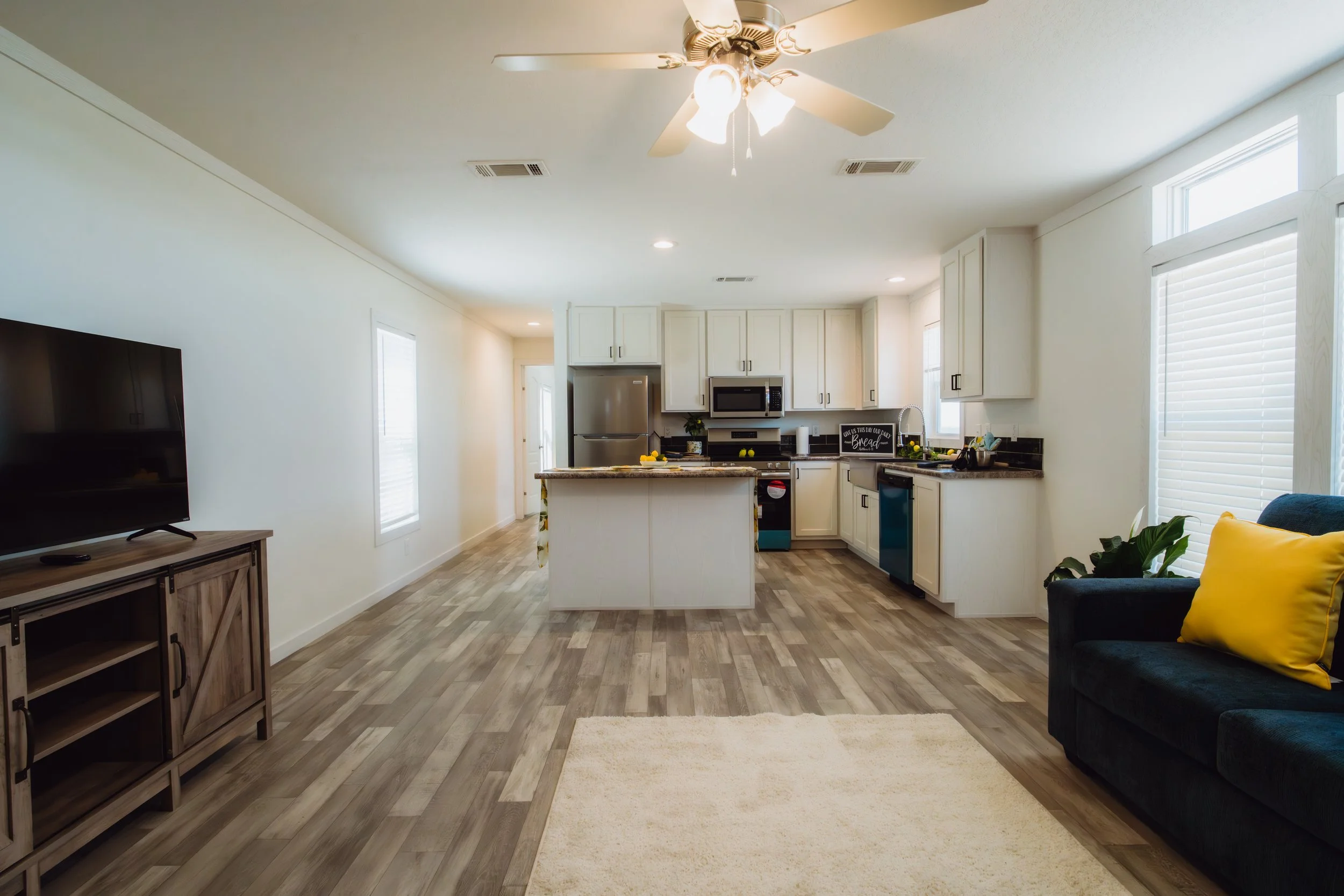 Open concept living and kitchen interior at Homestead Corpus Christi photographed by 2ten Marketing