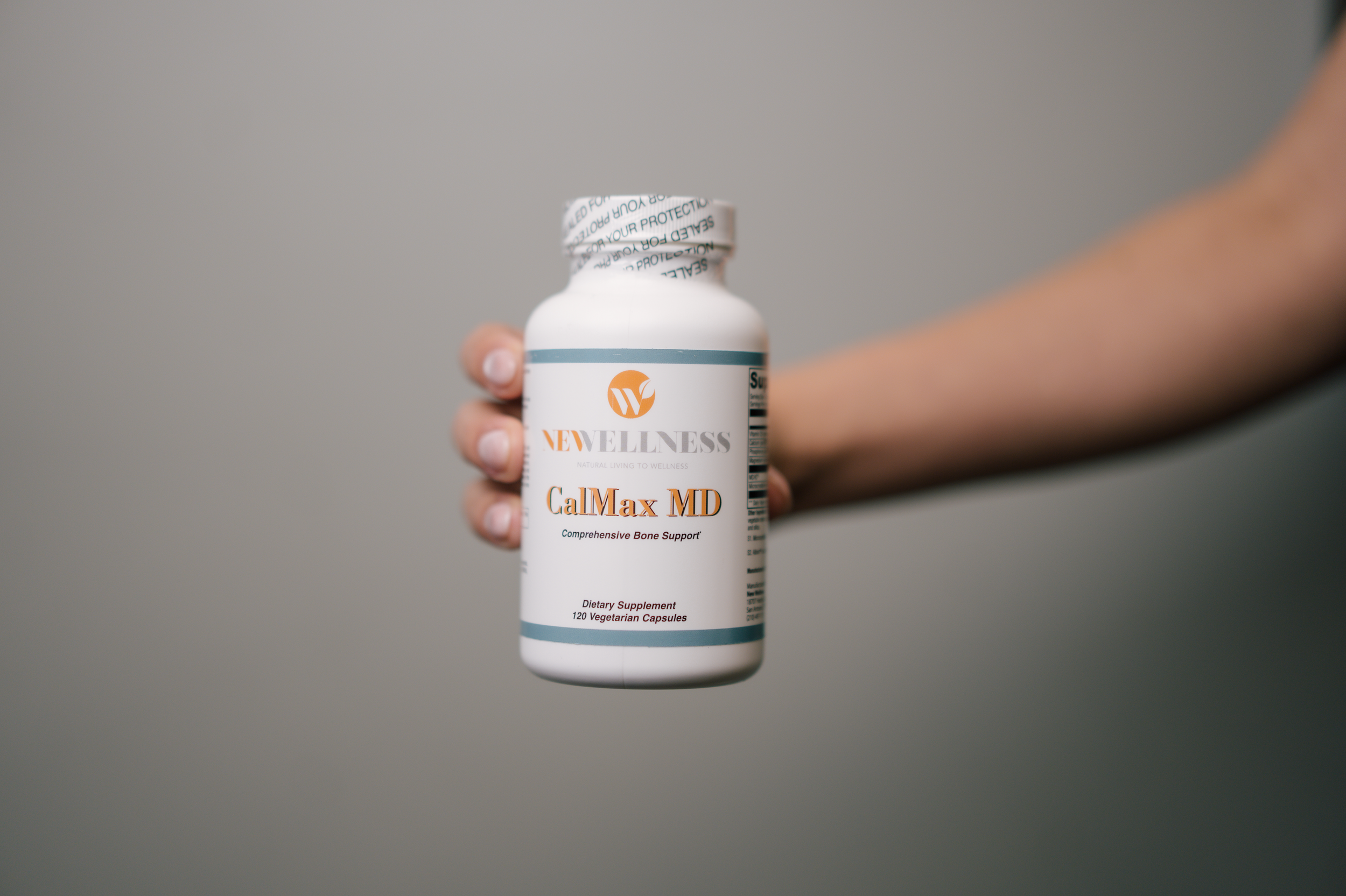 Wellness clinic photography featuring patient education and supplement consultation