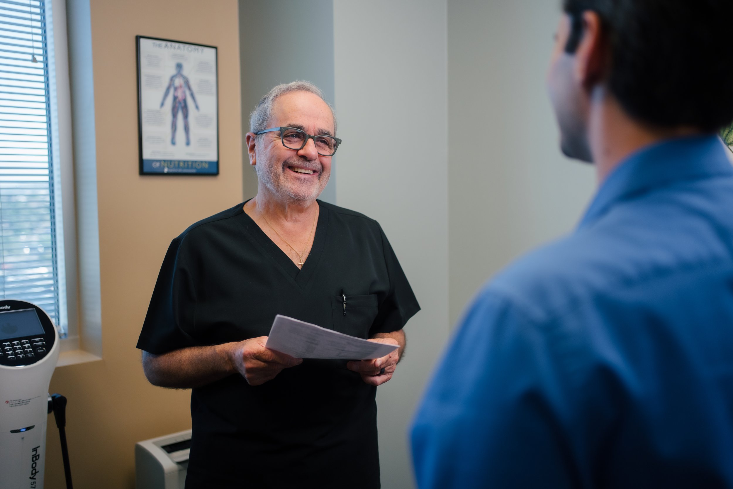 Medical aesthetics photography capturing hormone therapy consultation in wellness practice