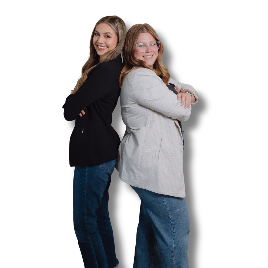 Two team members of 2ten Marketing standing back to back