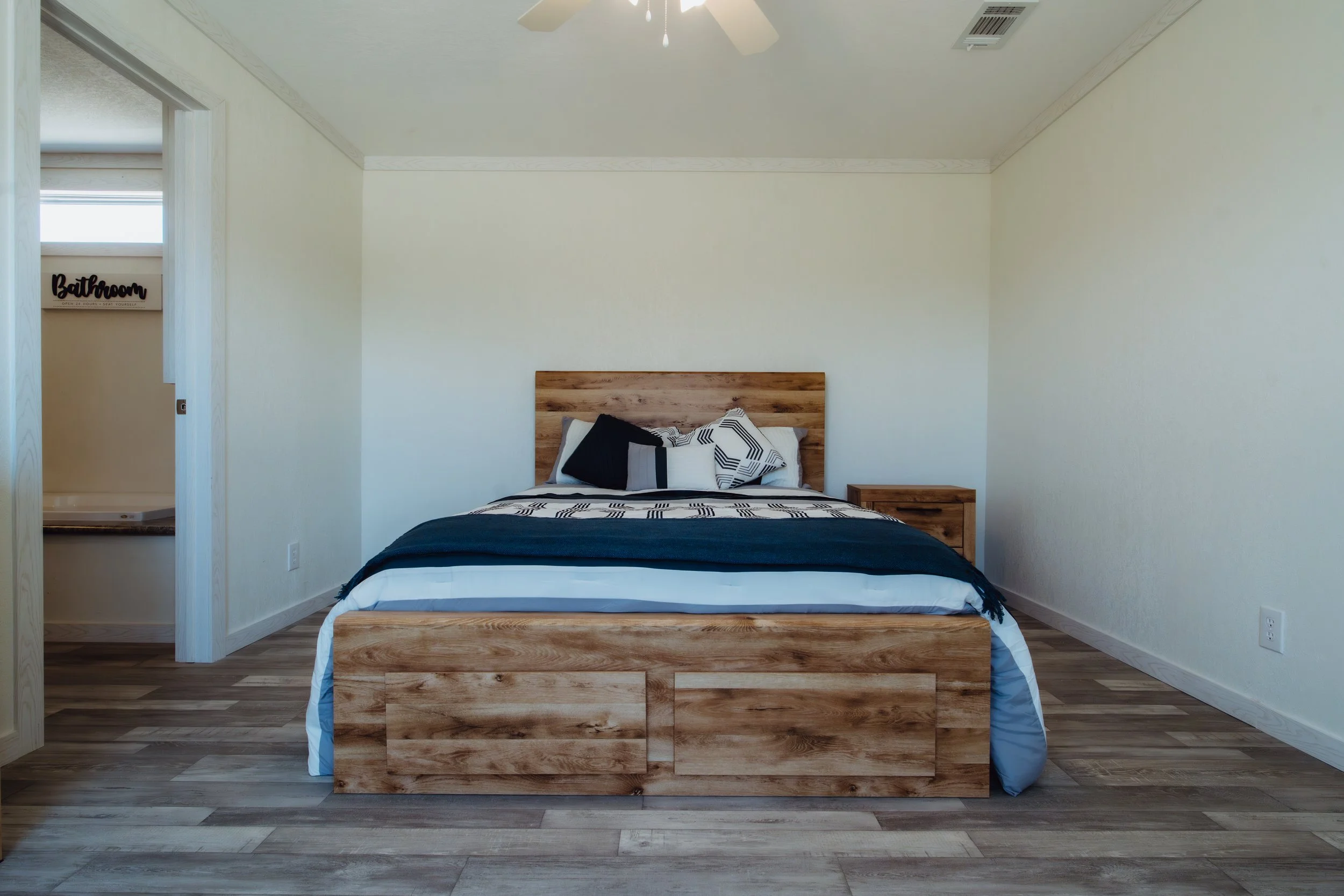 Primary bedroom interior at Homestead Corpus Christi photographed for community marketing