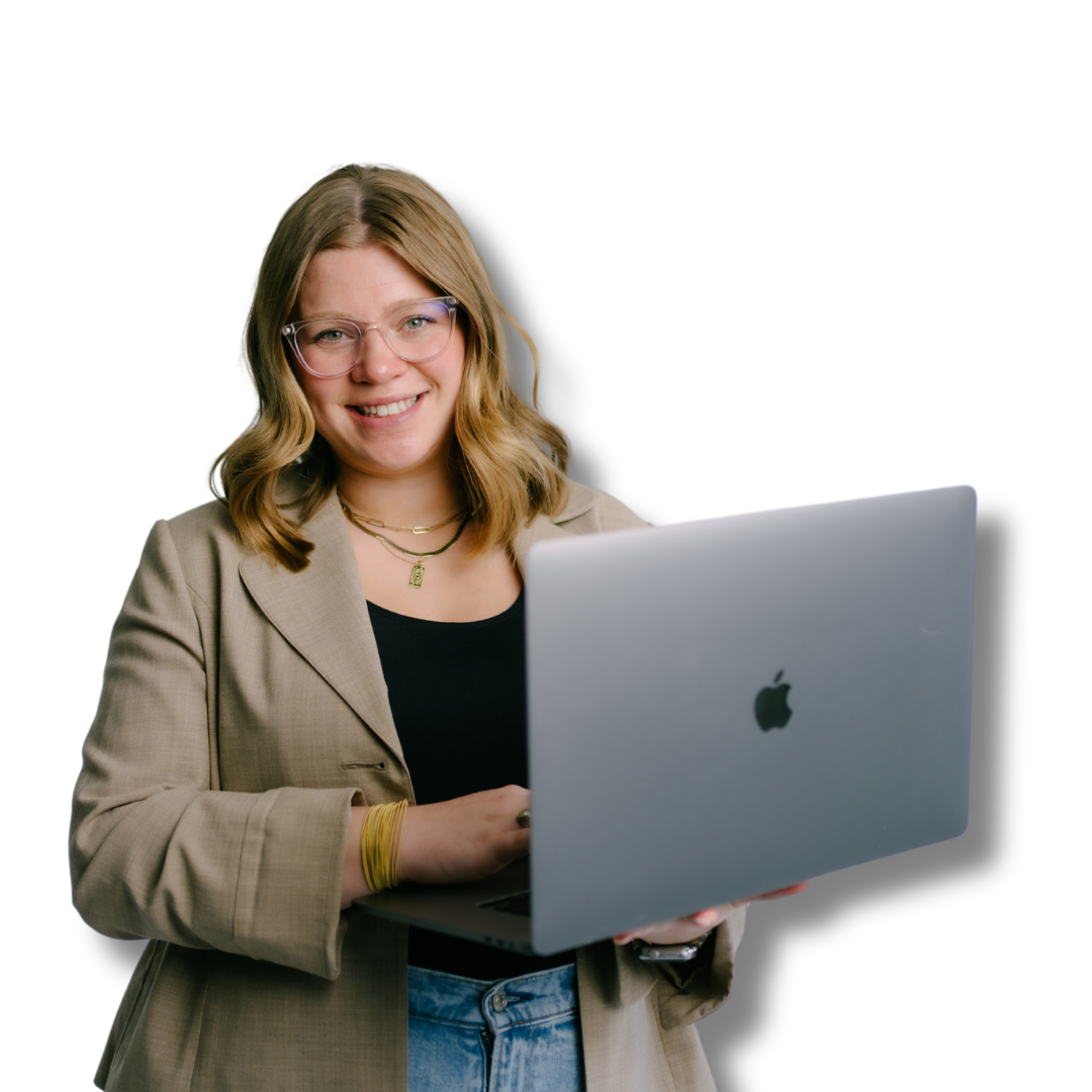 2ten Marketing Employee Standing with Laptop, Smiling