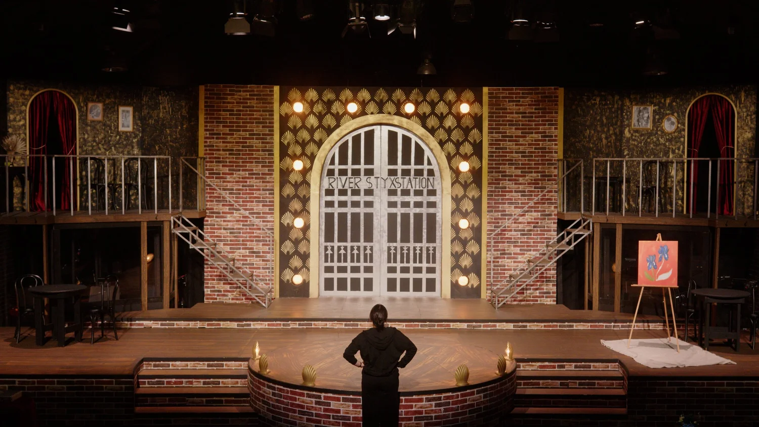 Kennedy Kemmerer directing a theatrical production