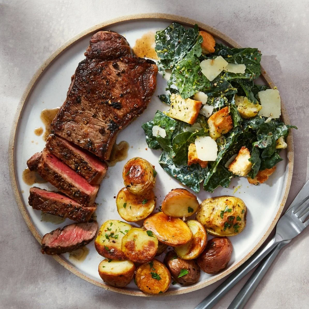 Plated_Steak_Kale_Caesar_Potatoes_Juiced_Feature.jpg