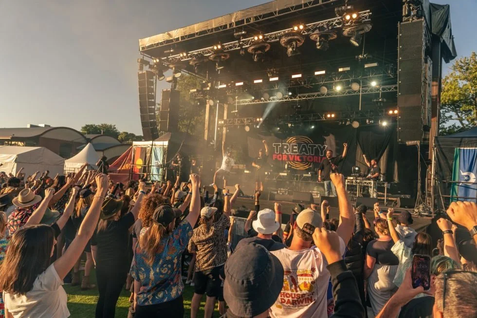 A lively concert crowd gathered around a stage at Treaty Day Out.