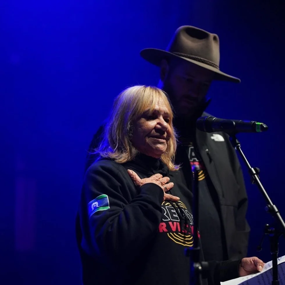 A woman and a man standing together at Treaty Day Out.