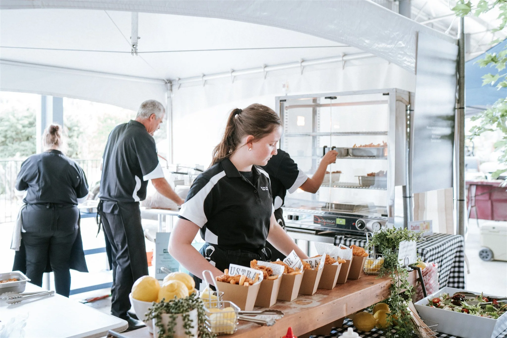 Furphy 150 Year Celebration: Commemorative event featuring a historic Furphy water cart and a group of individuals celebrating 150 years of Furphy