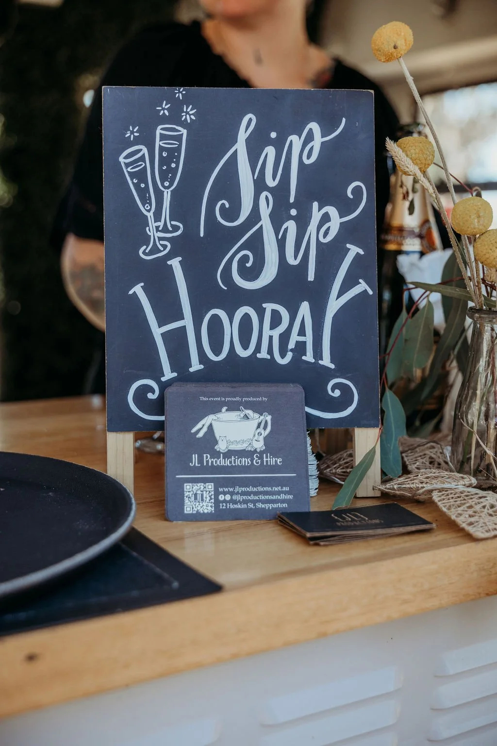 Sip Sip Hooray sign on a caravan bar, inviting you to enjoy a refreshing drink. Cheers to that!