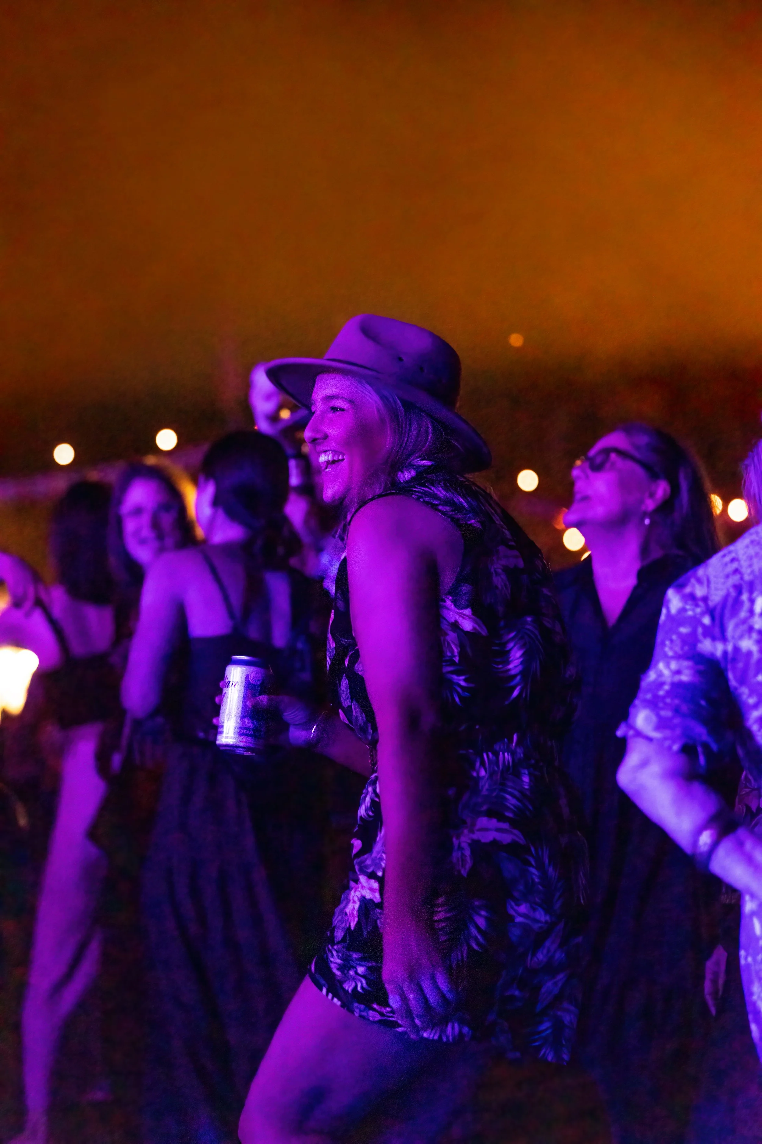 The crowd enjoying the music and dancing.