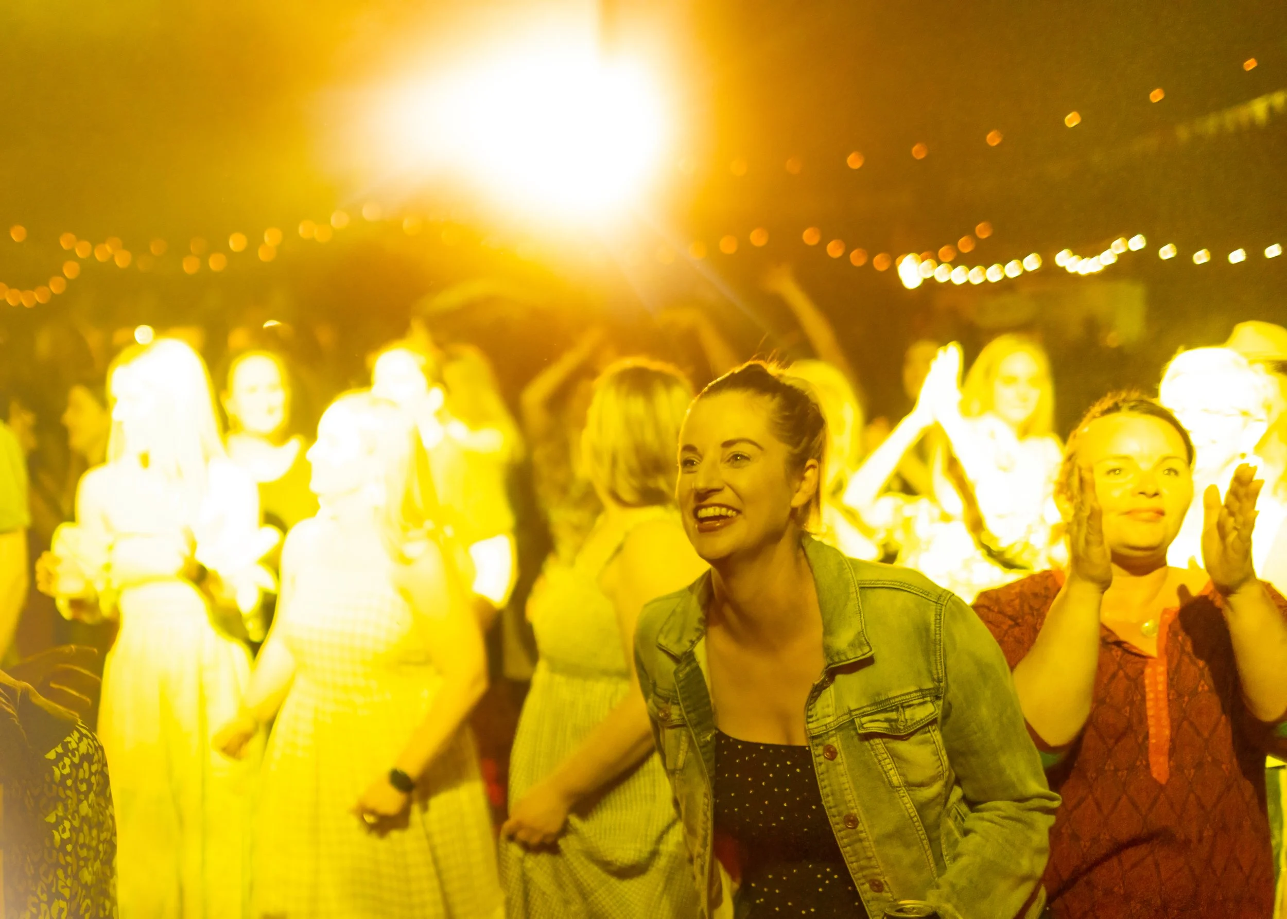 People smiling and dancing.