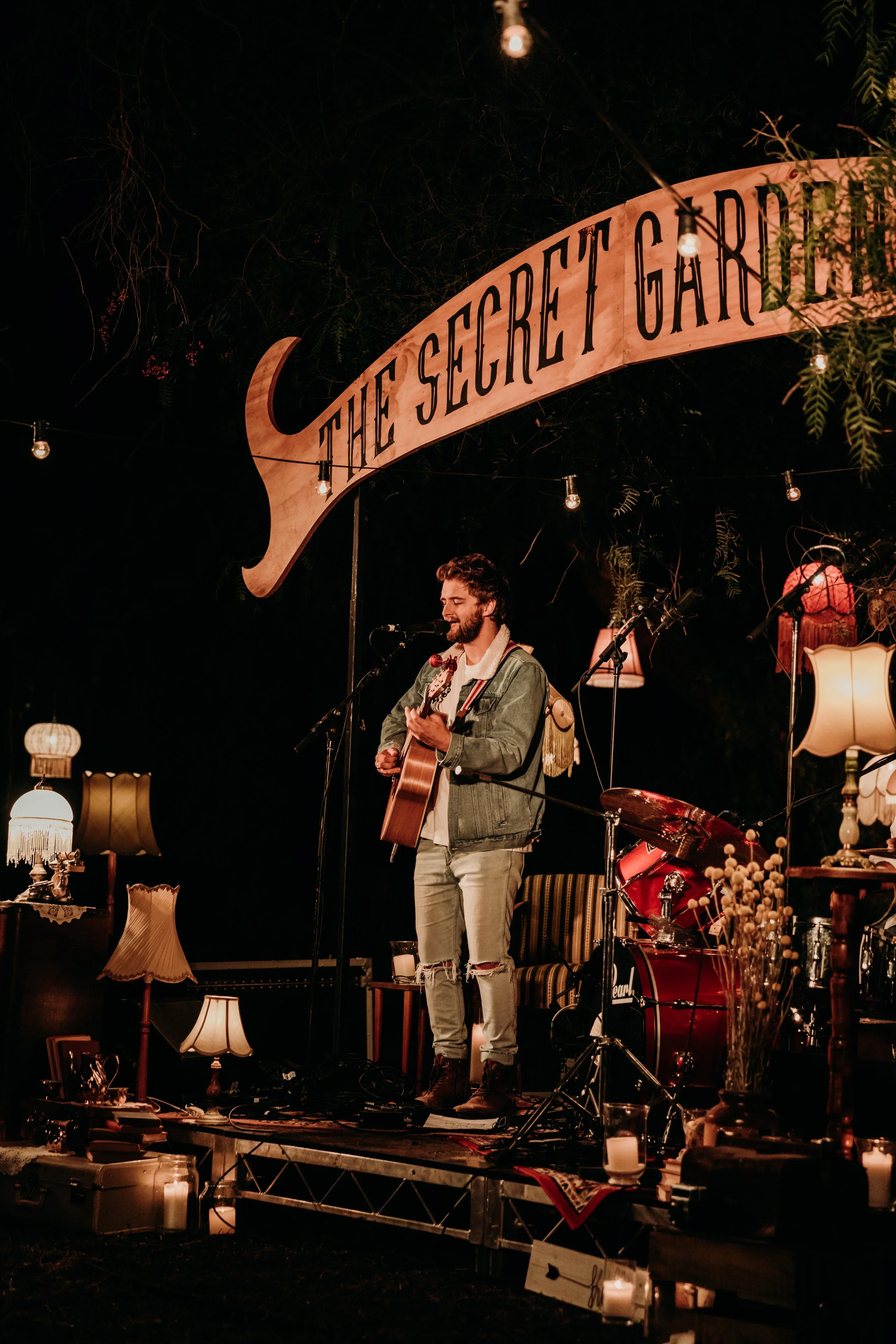 A young man performs for the crowd at Pine Lodge.