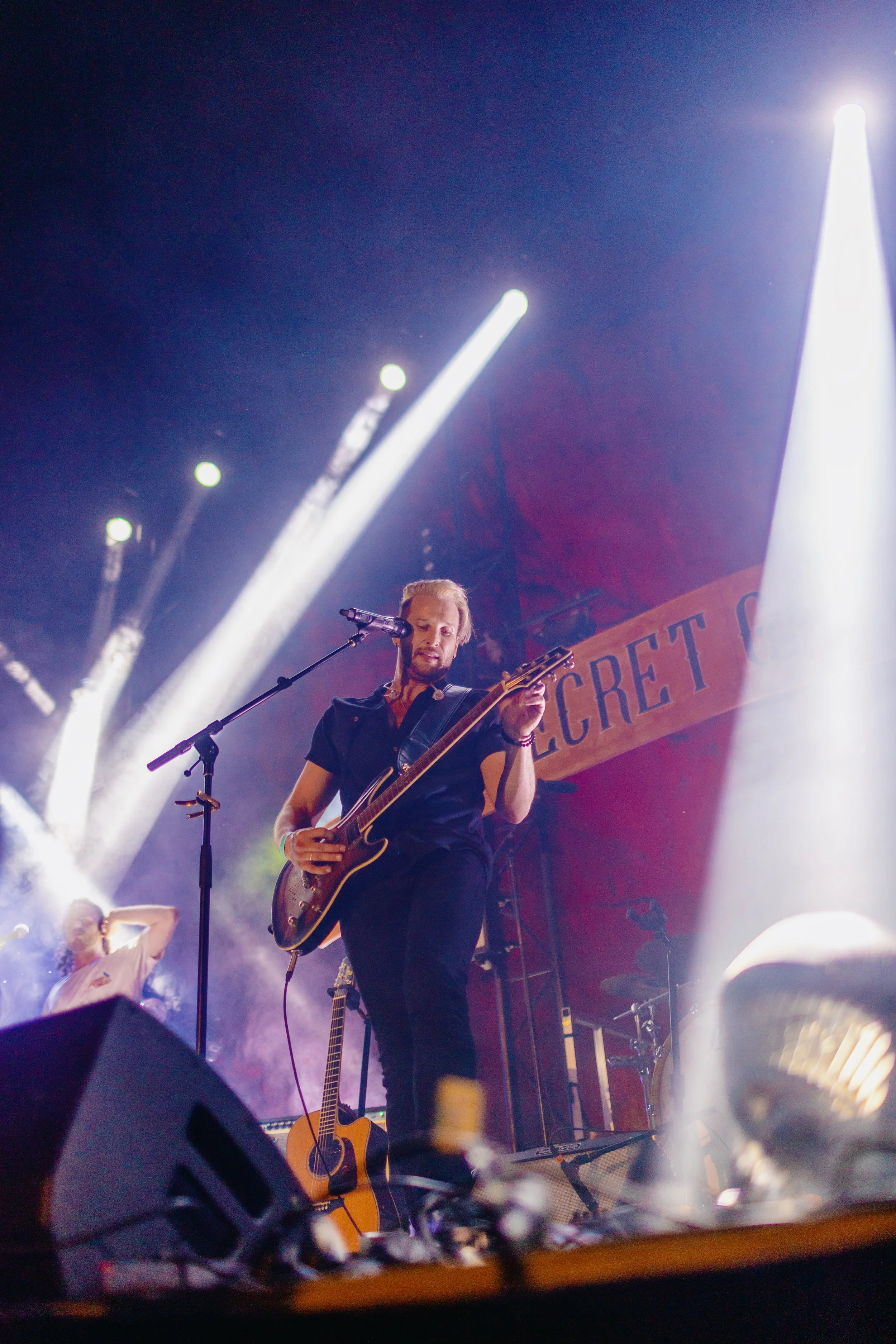 A man plays guitar at the Dookie Quarry.