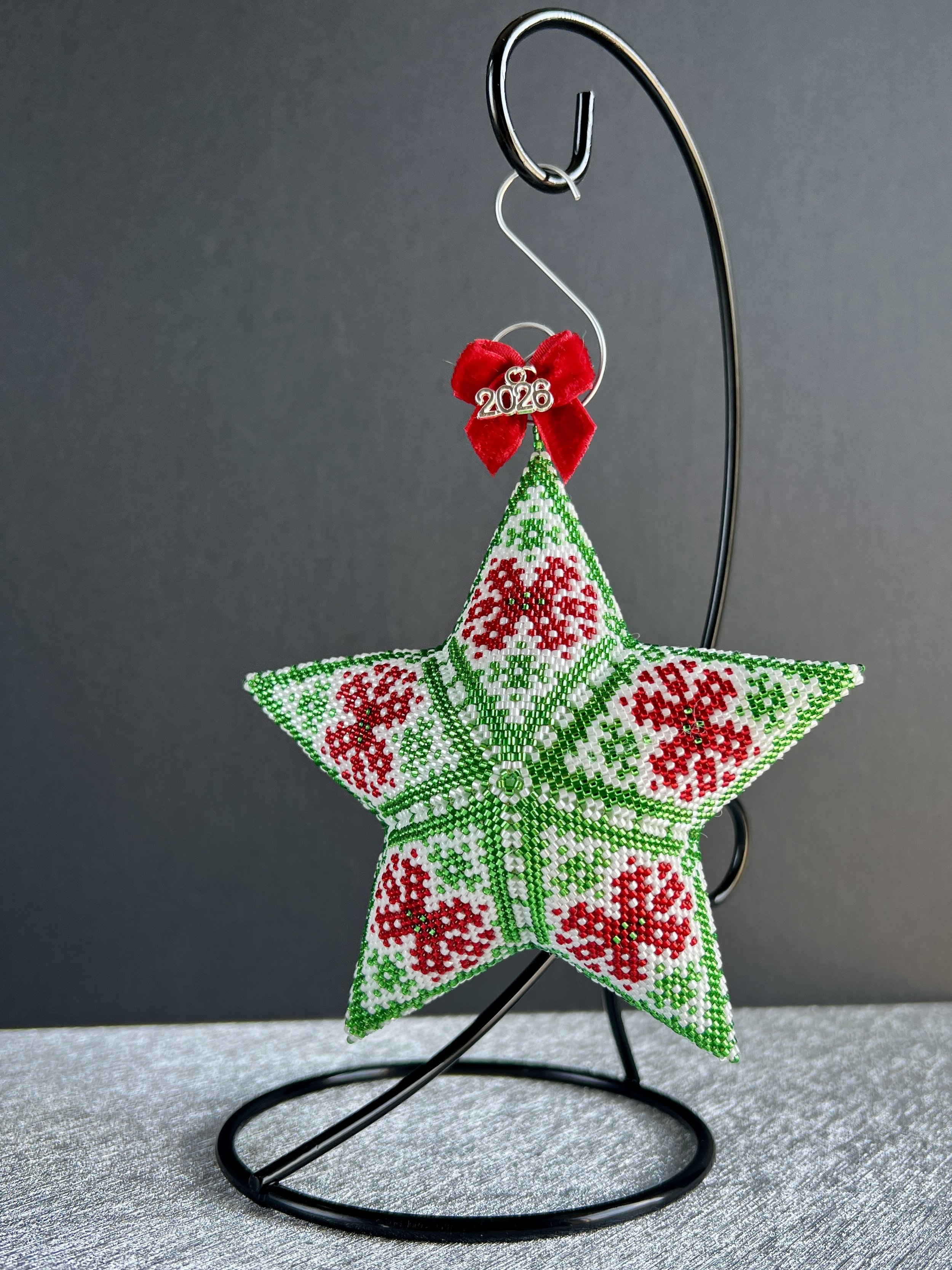 2026 Heirloom Beaded Star Ornament — Nordic Poinsettia