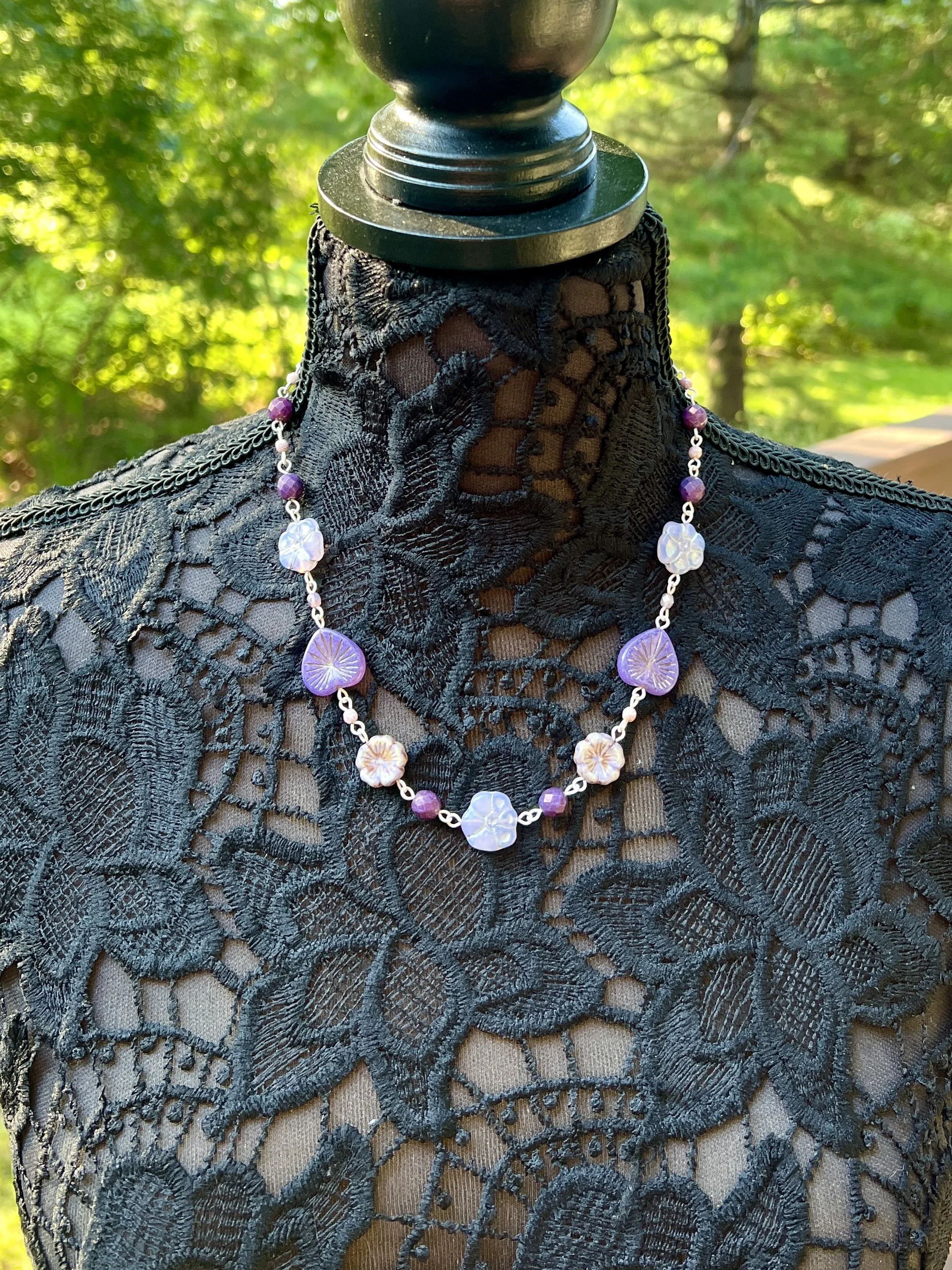 Handmade Czech glass necklace with lavender and cream pressed glass floral beads.