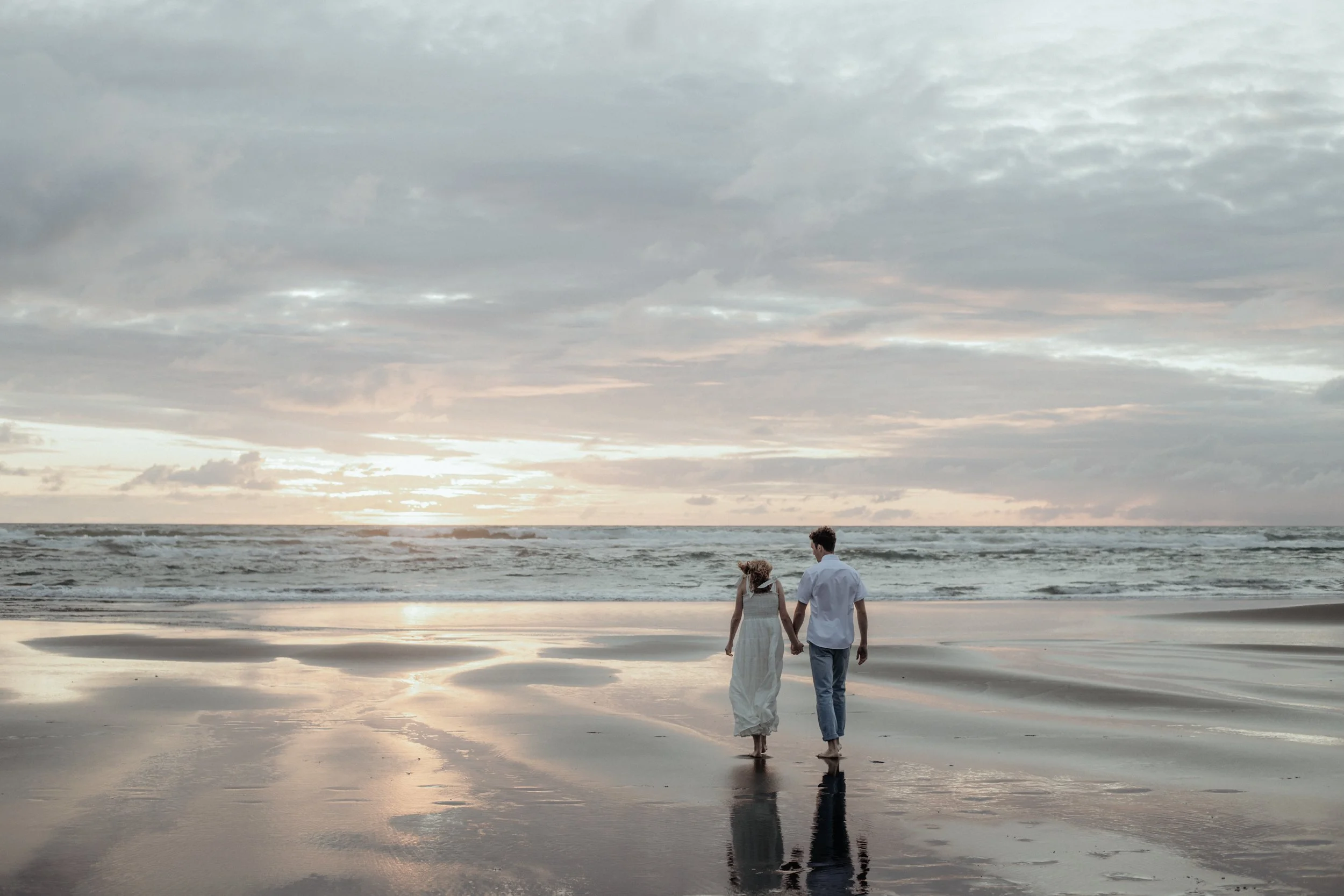 Piha Beach engagement photoshoot at sunset.