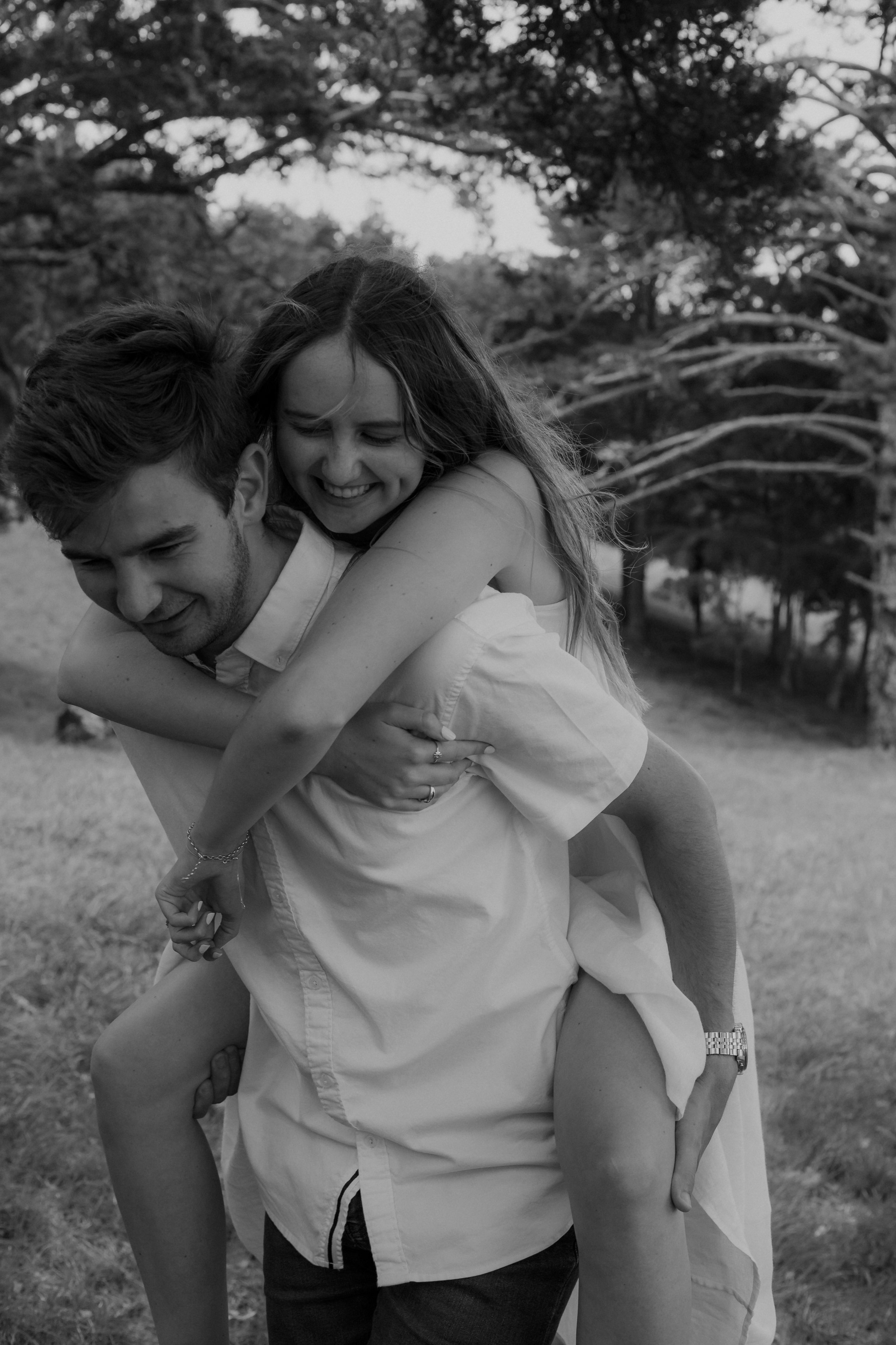 Romantic engagement photography in natural New Zealand landscape.