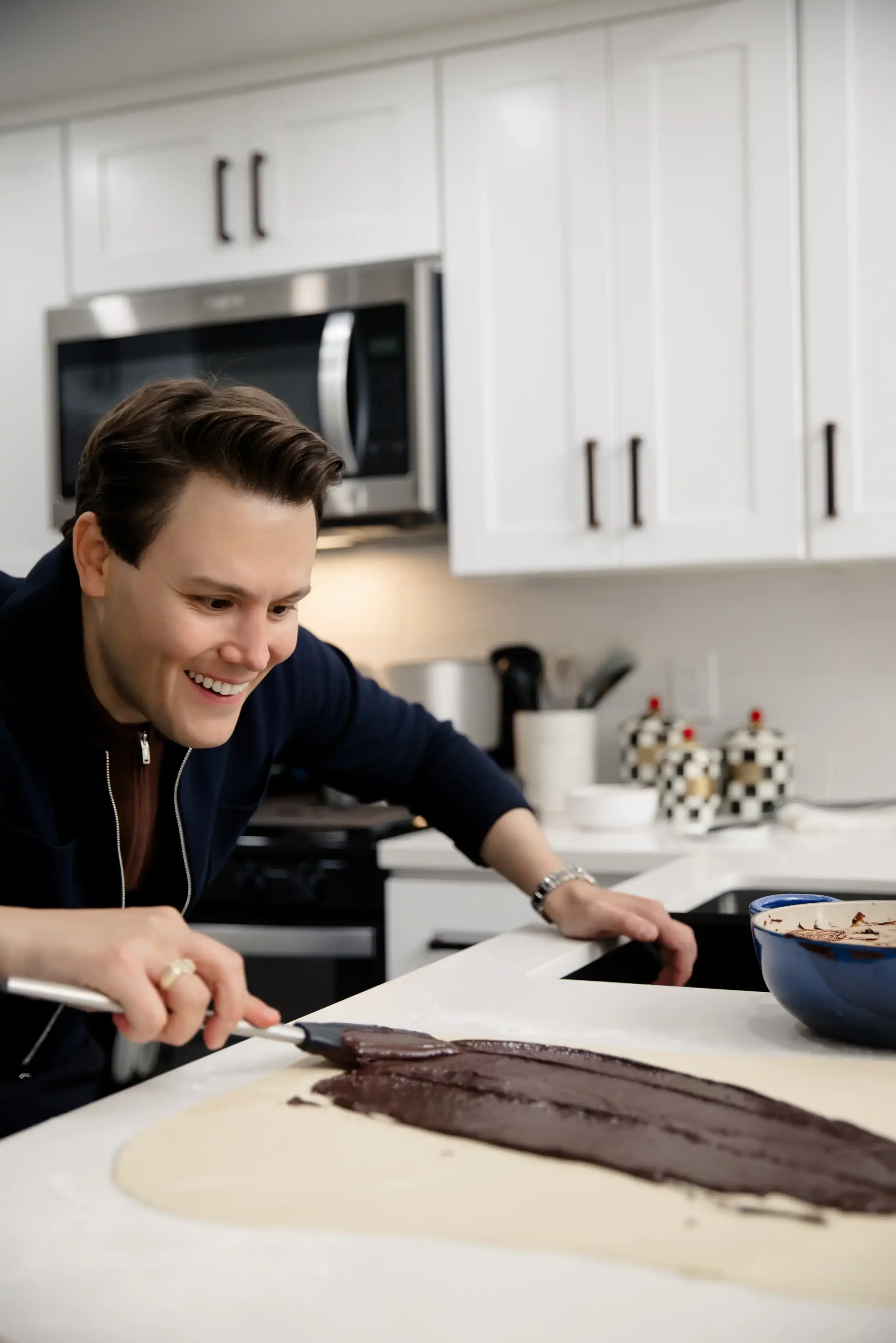 Matthew Hoffman in the kitchen on the Fame to Table set