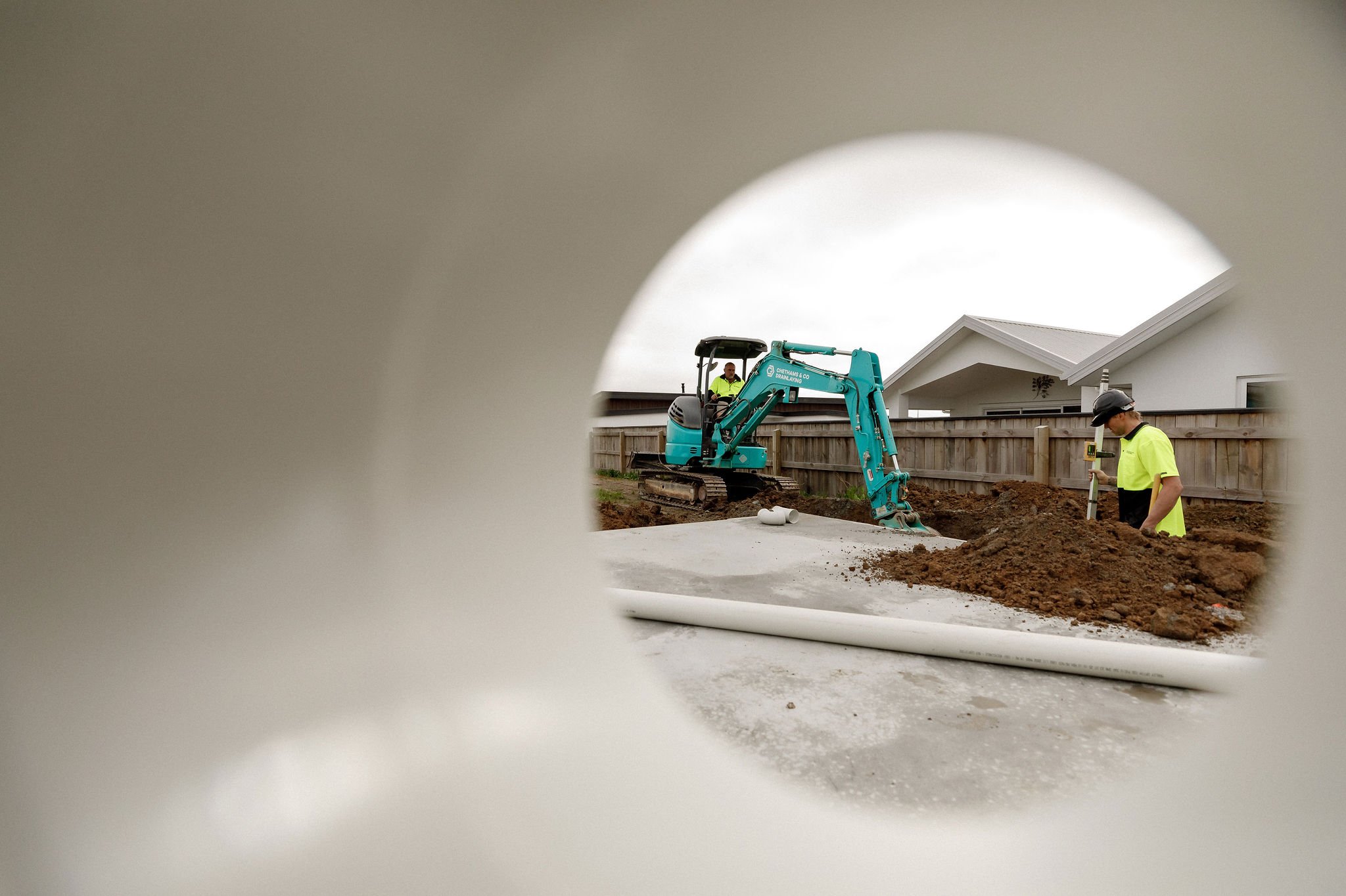 Drainlayers through PVC pipe - Chethams & Co Drainlaying.jpg