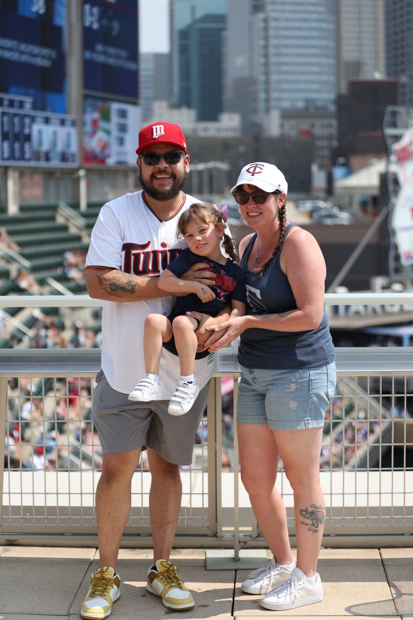 Relocating to Minnesota with Archie Homes Group - Family enjoying a Twins game at Target Field.