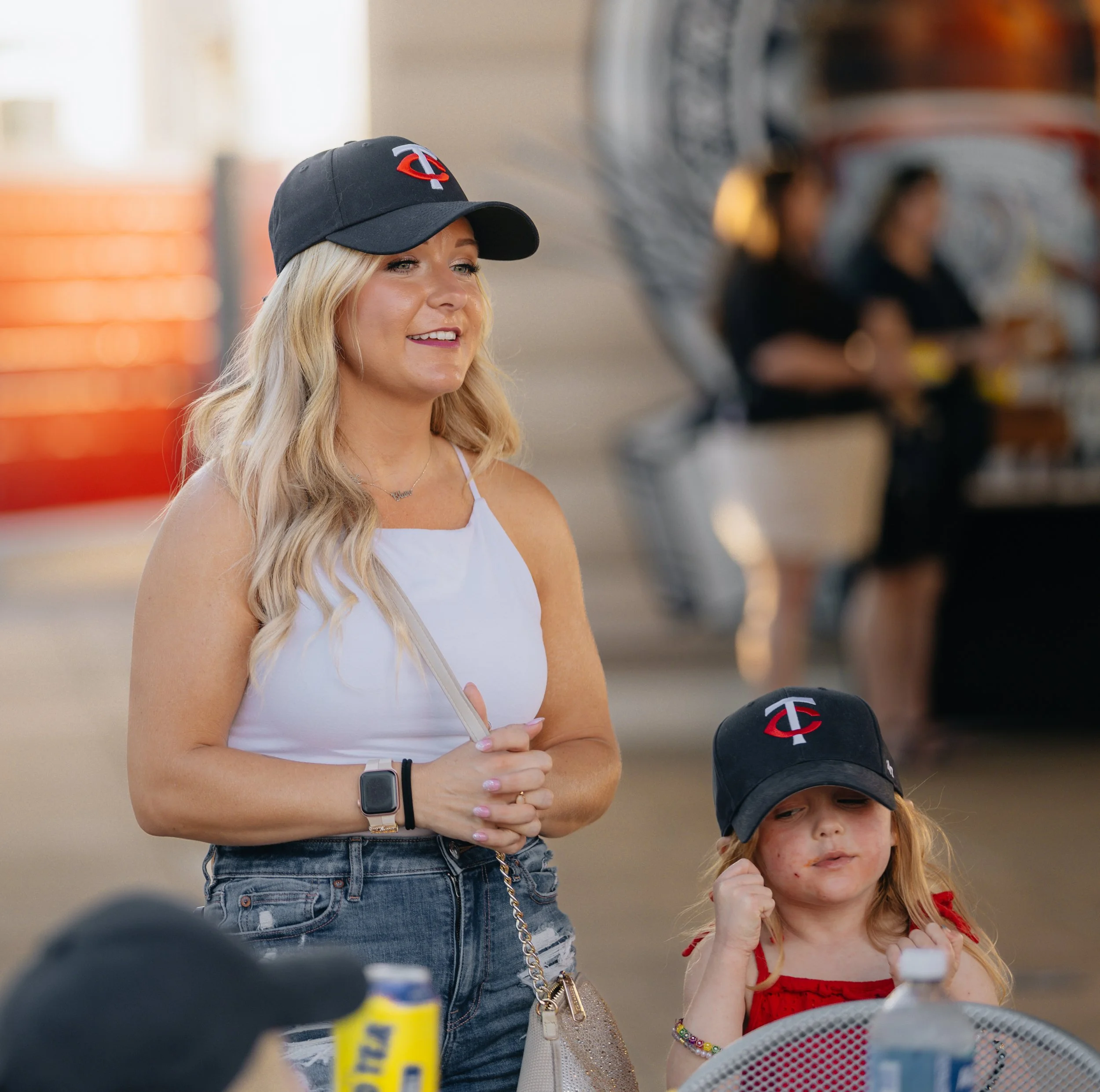 Relocating to Minnesota with Archie Homes Group - Family enjoying a Twins game at Target Field.