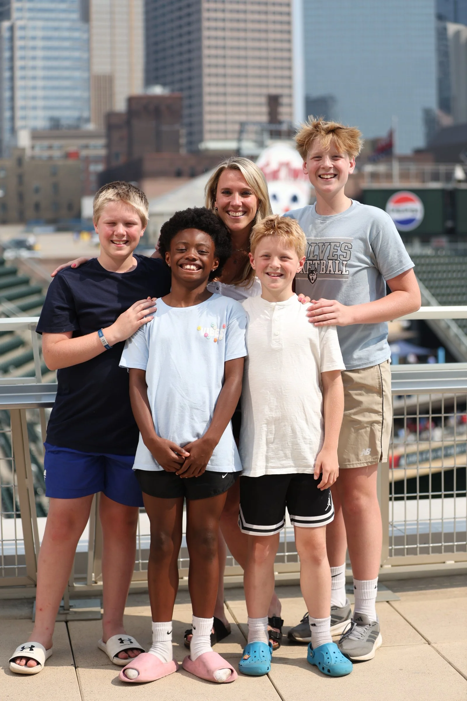 Relocating to Minnesota with Archie Homes Group - Family enjoying a Twins game at Target Field.