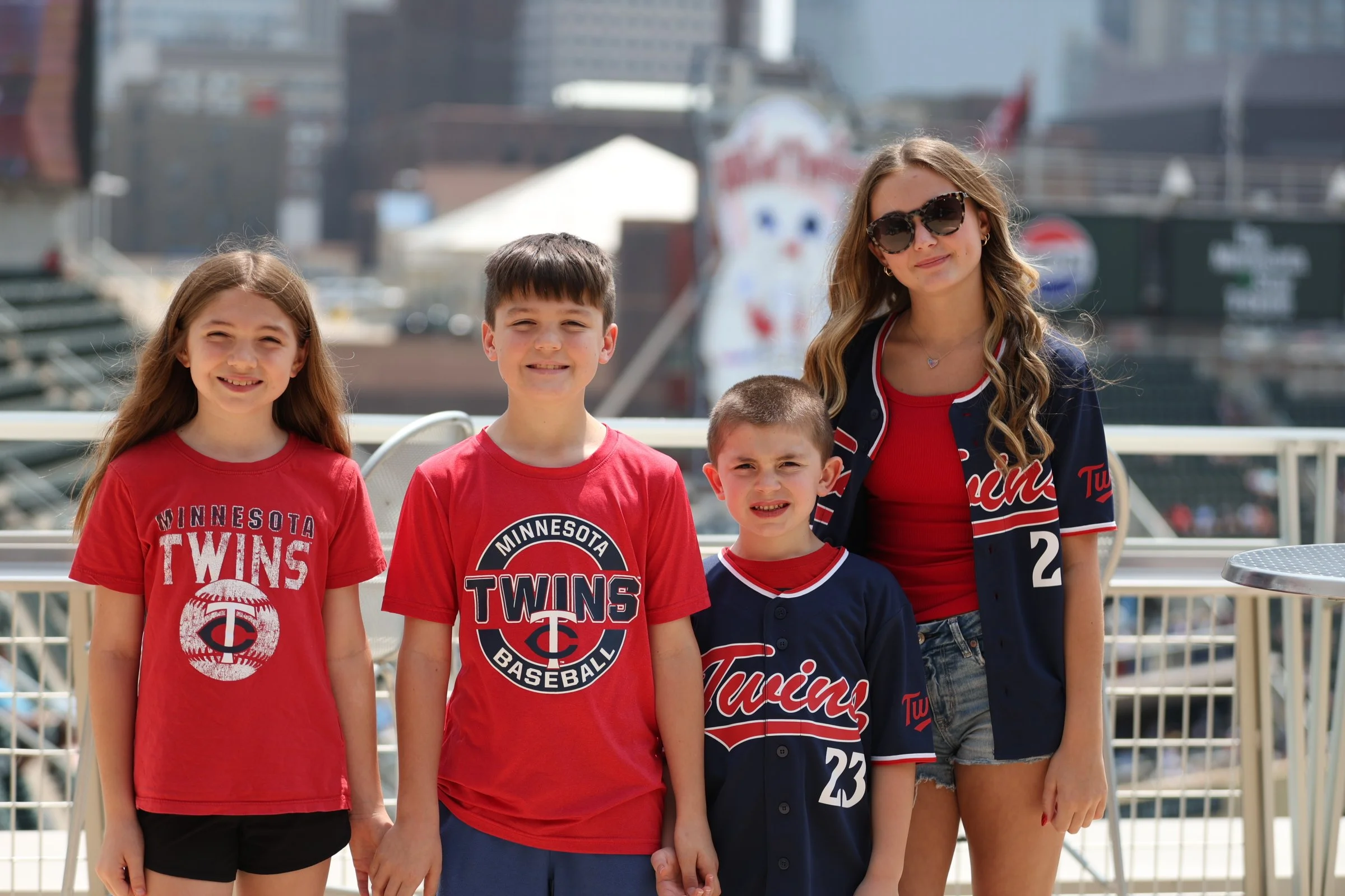Relocating to Minnesota with Archie Homes Group - Family enjoying a Twins game at Target Field.