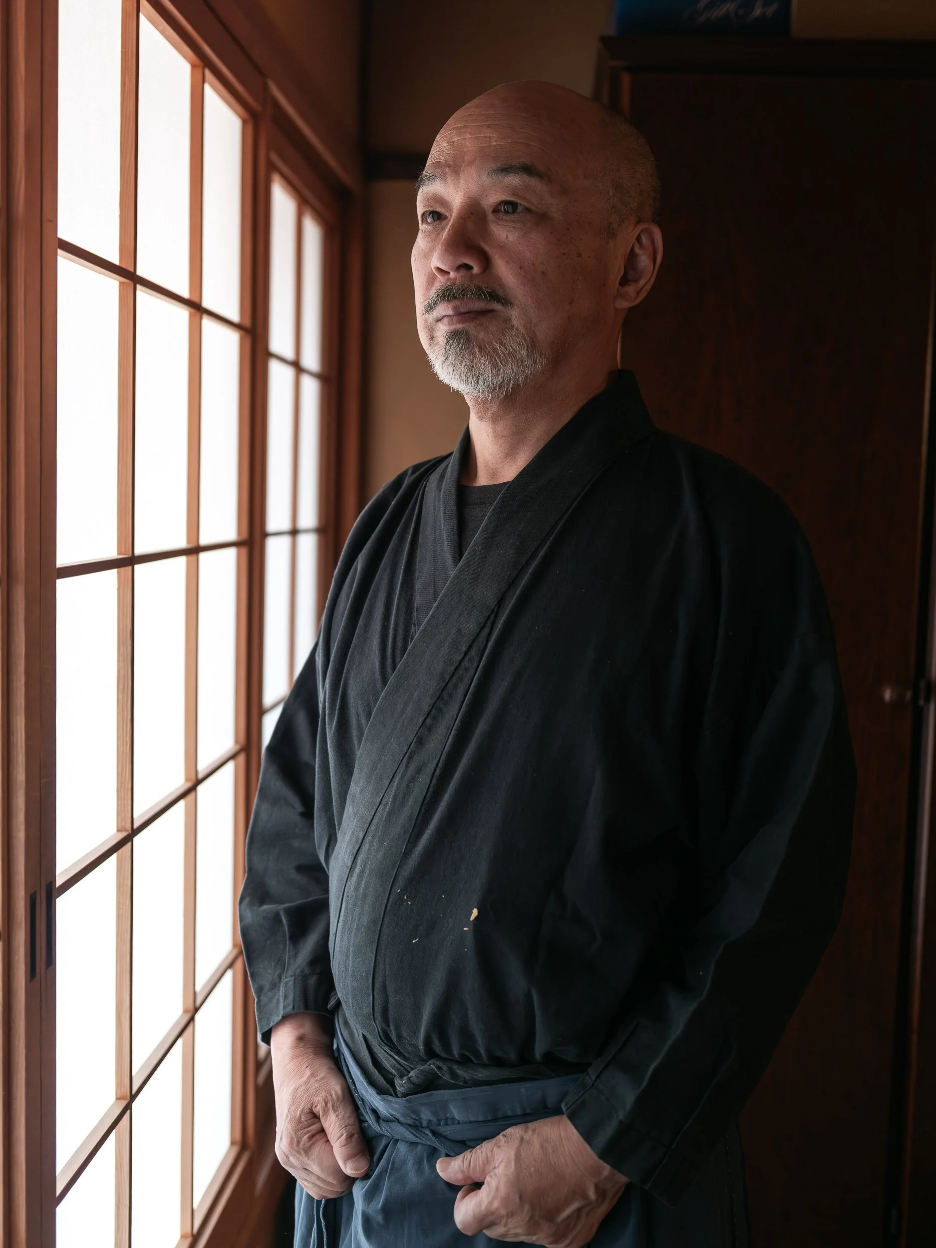 Noh mask master sculptor Ohtsuki Koukun in his workshop in Kyoto.