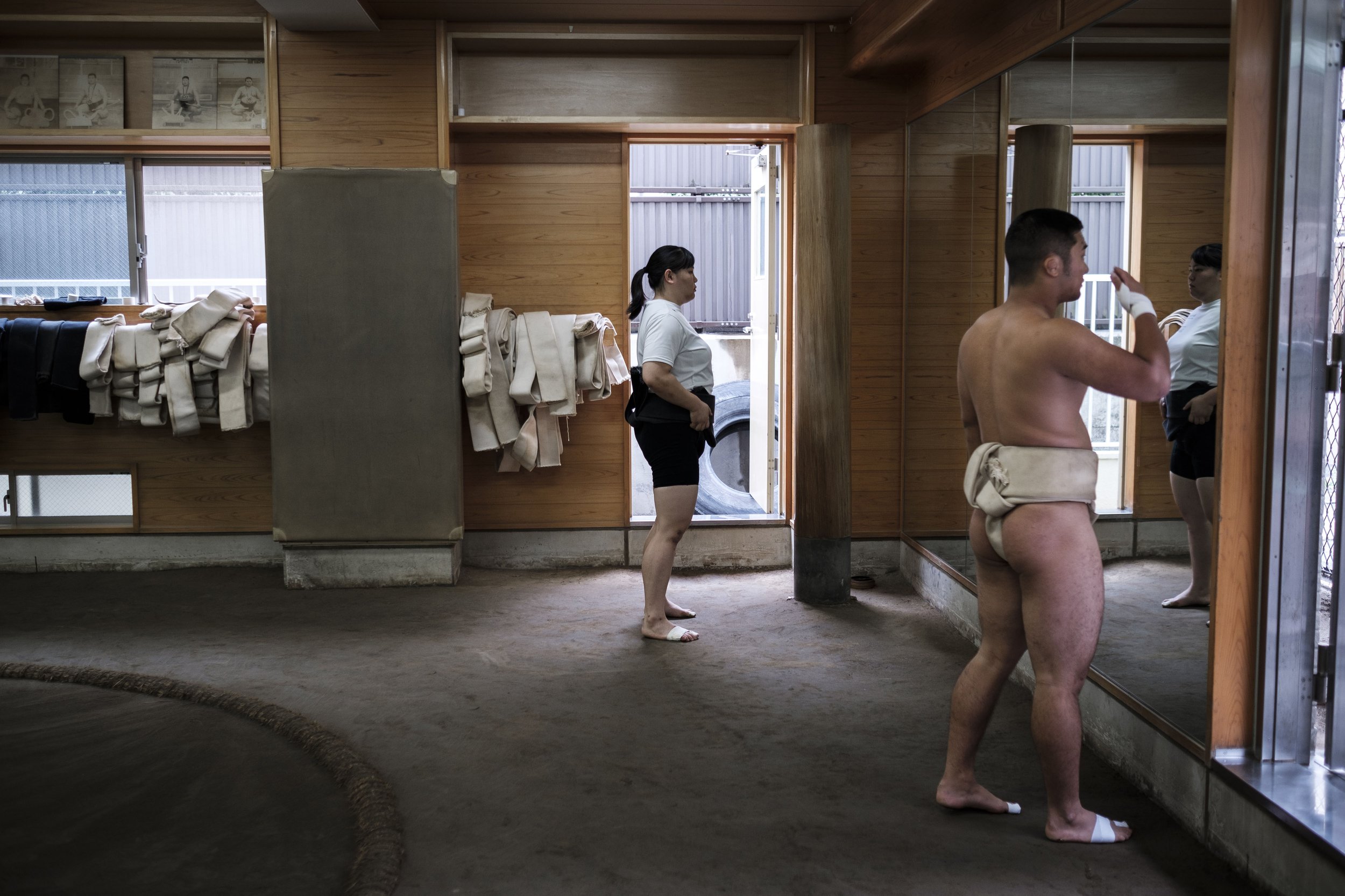 Seina (21 years old) practices her "taichi-ai" during an early morning training at the university stable.