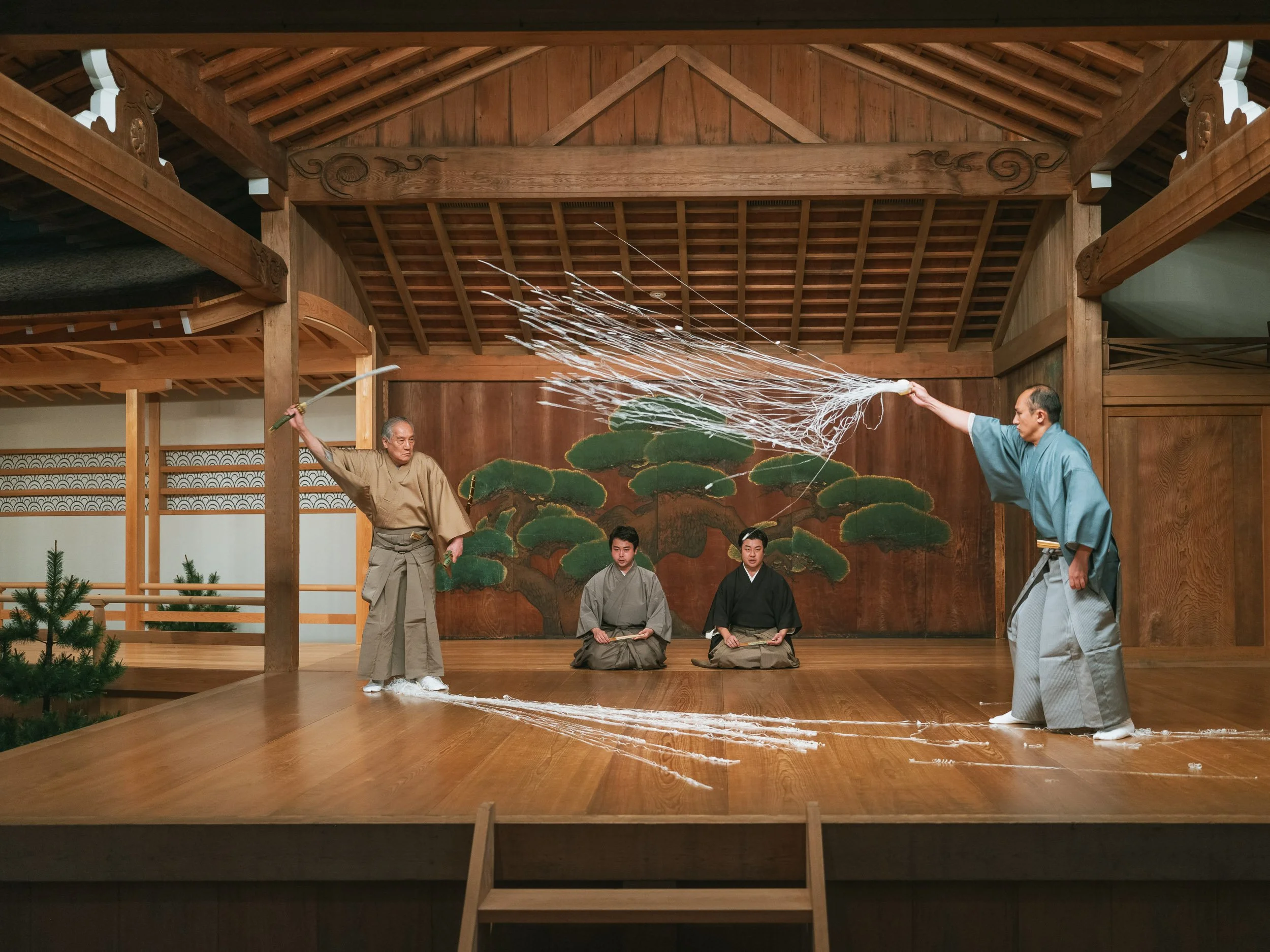 Two actors rehearse one last time before departing for Paris.