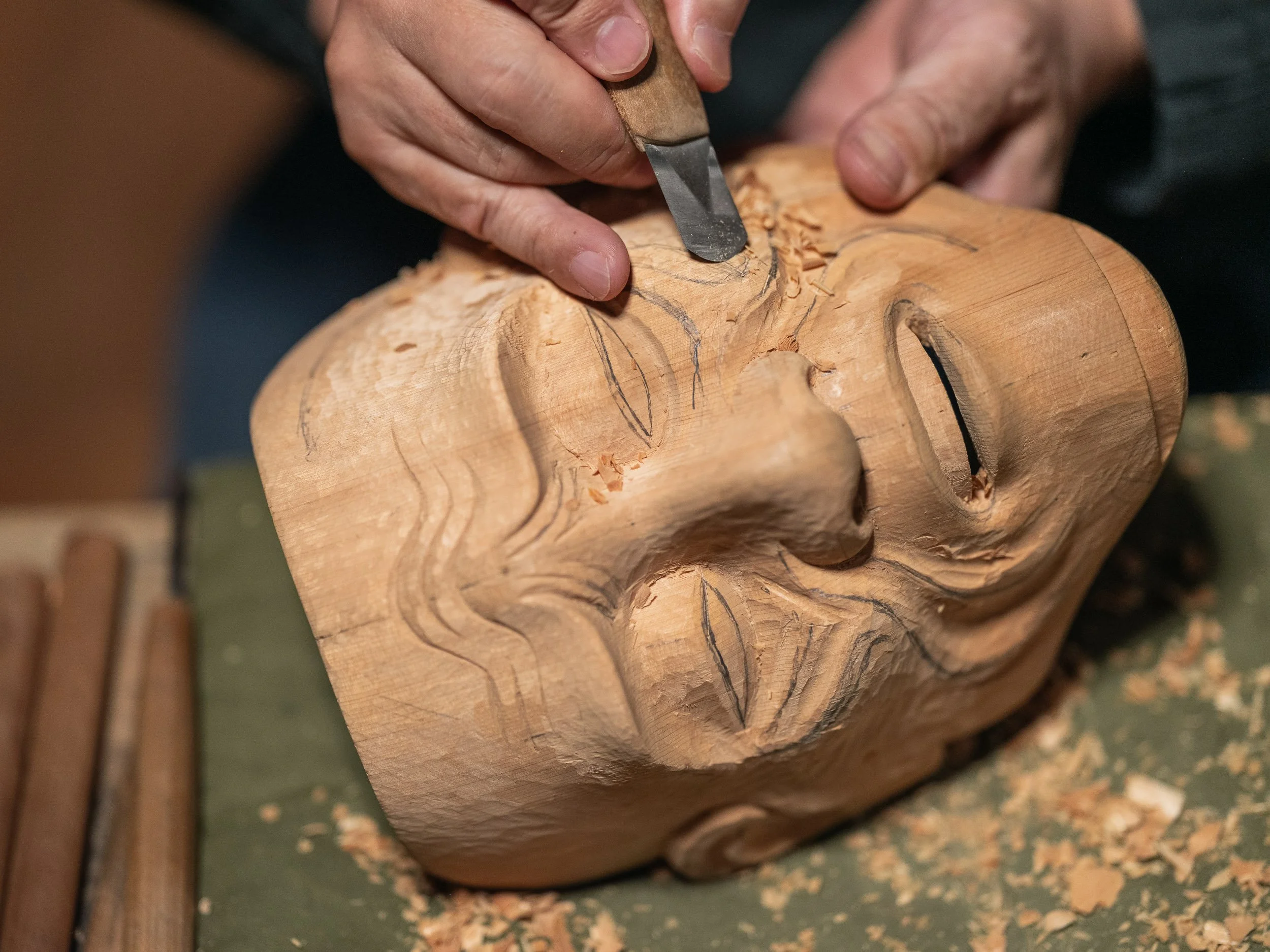 Noh mask master sculptor Ohtsuki Koukun in his workshop in Kyoto.