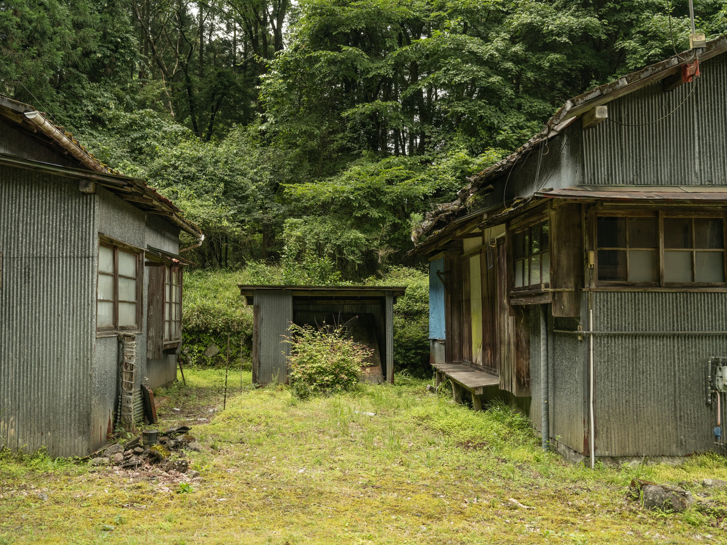 Old, abandoned workers' homes near Kanmangafuchi Abyss on July 17, 2023 in Nikko Japan.