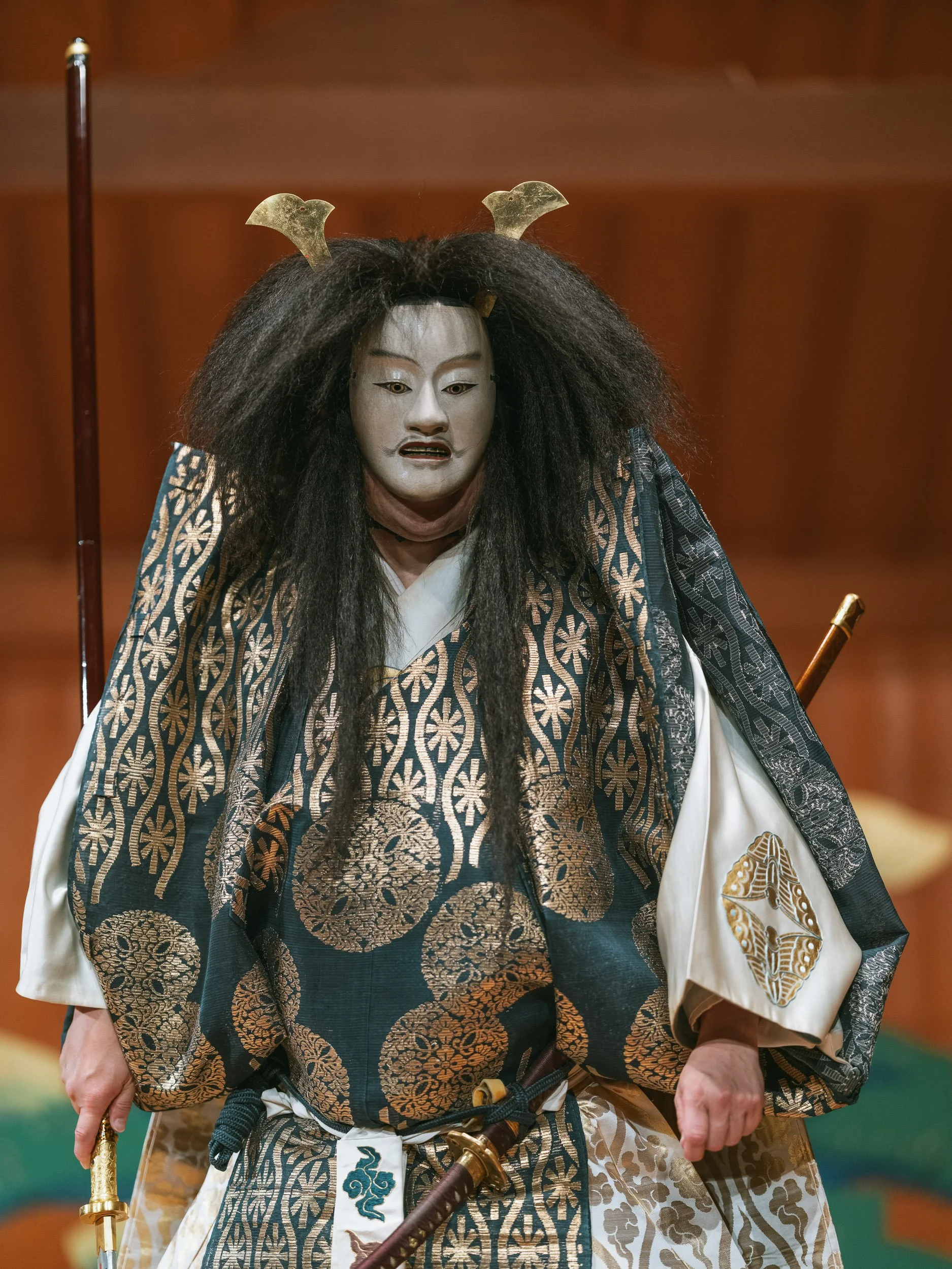 Kuroemon Katayama in the costume and mask of “Funa-Benkei,” on stage in Kyoto, Japan, during the final rehearsal.