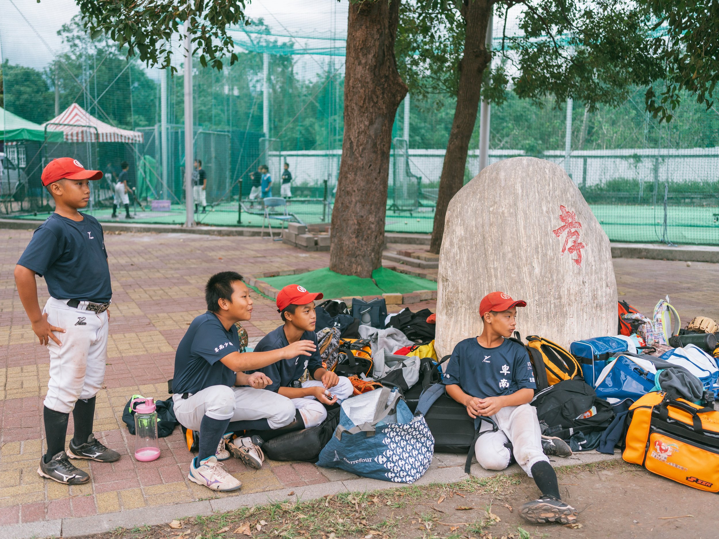Children from Team A of Bei-Nan Elementary School rest after a training in the afternoon.