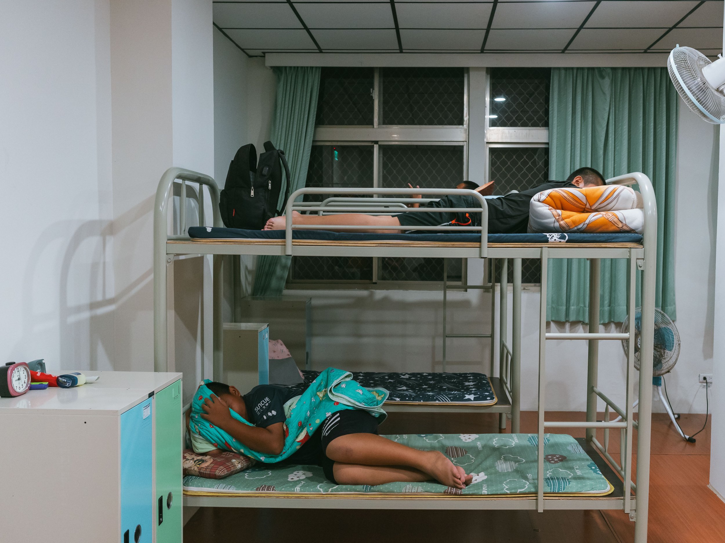The children in the boarding school ready to sleep.