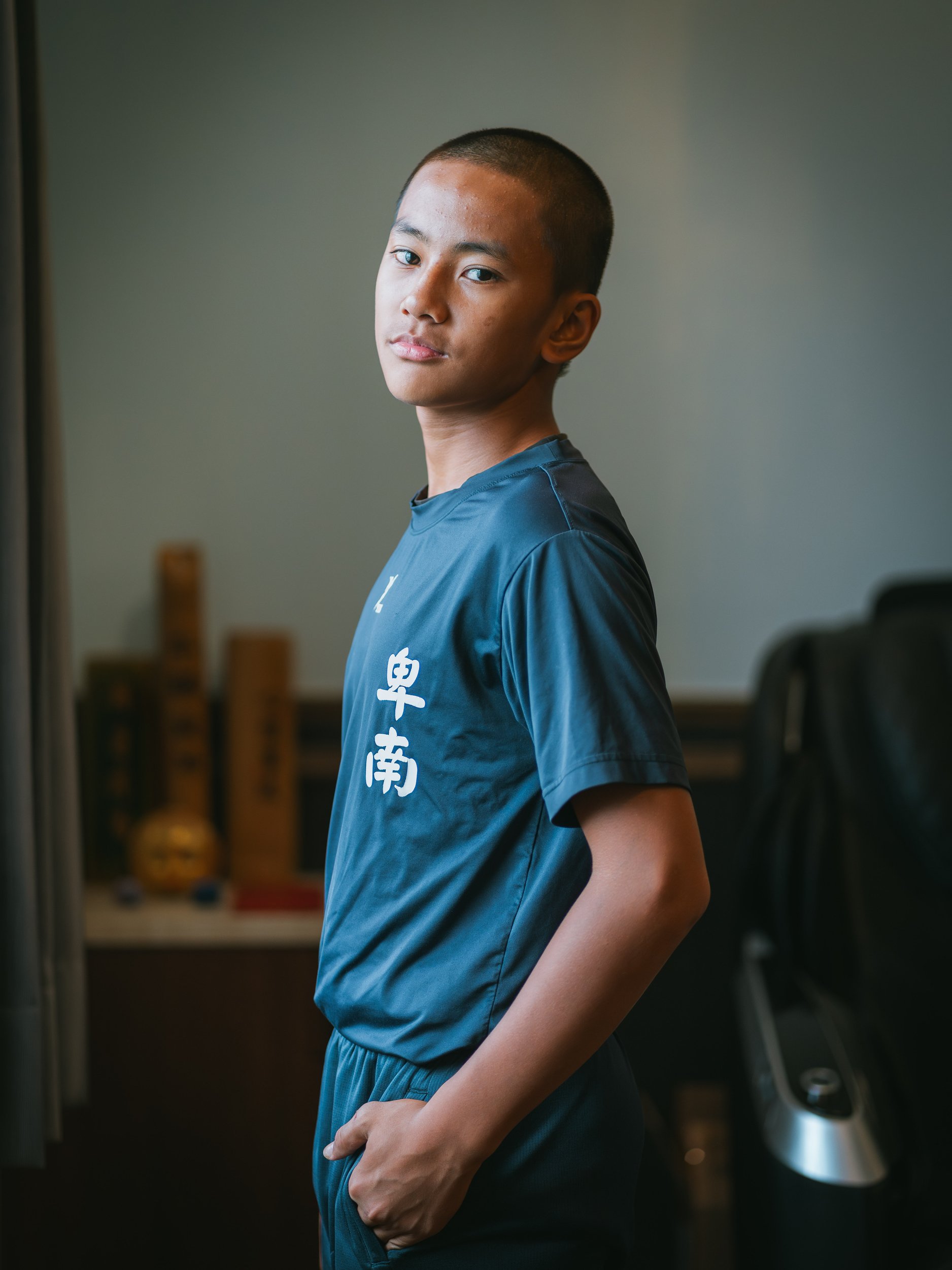 Yeh Hao-yu, the captain of the baseball Team A of Bei-Nan Elementary School, in his room for a photo.